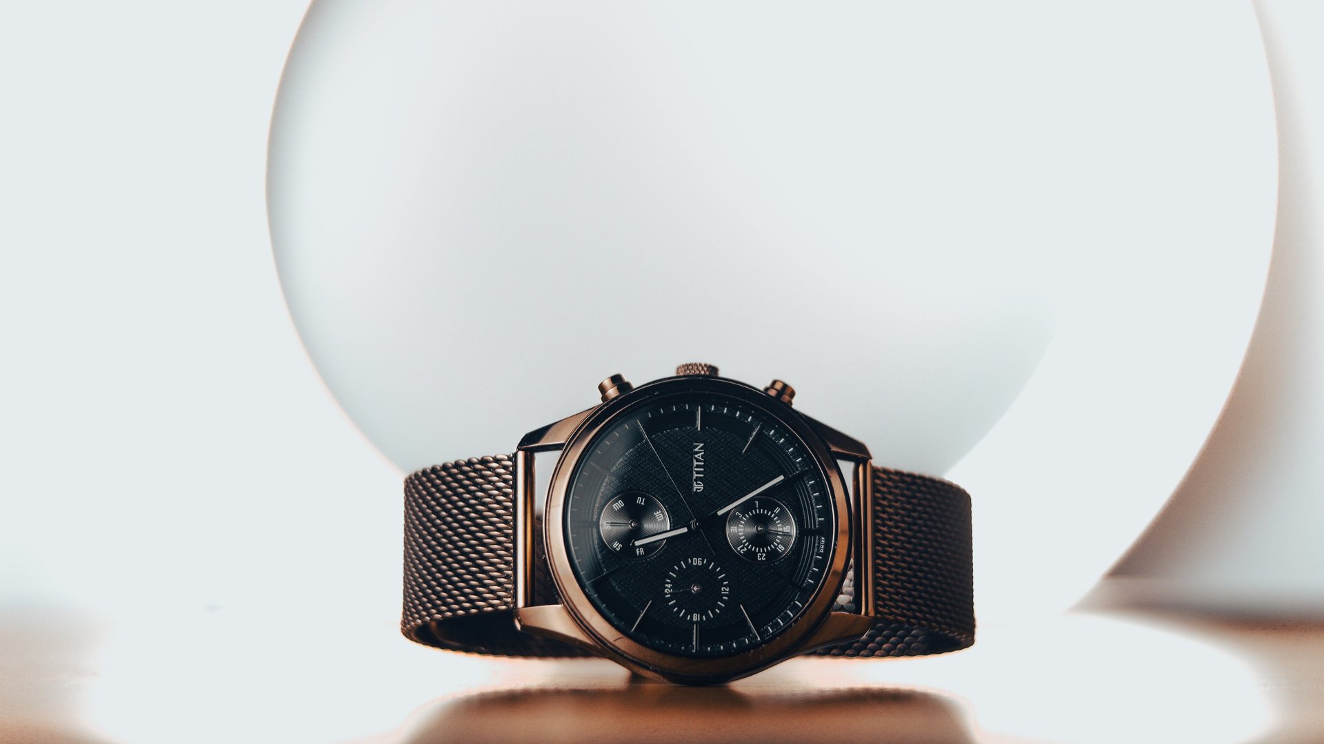 black and brown leather padded tub sofa