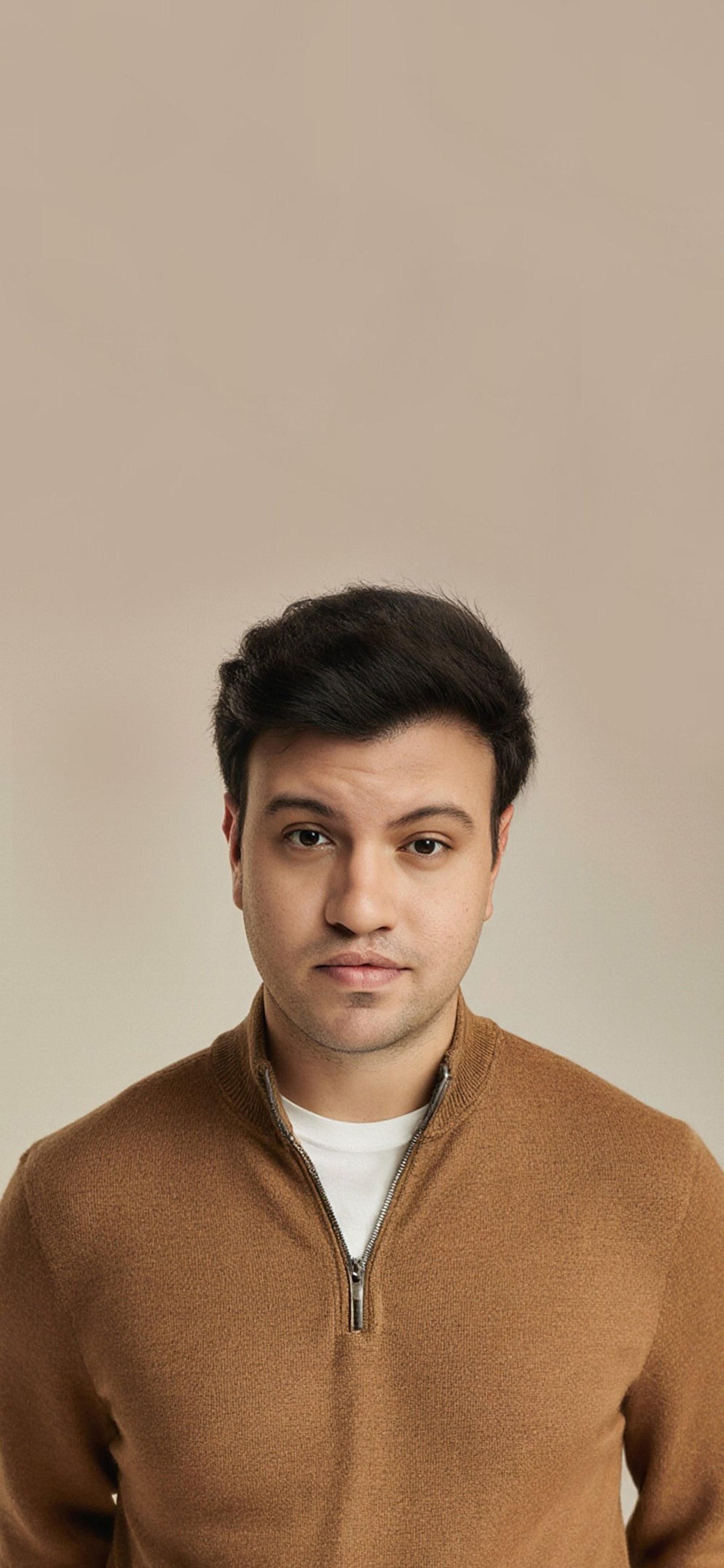 man sitting on purple cushion armchair