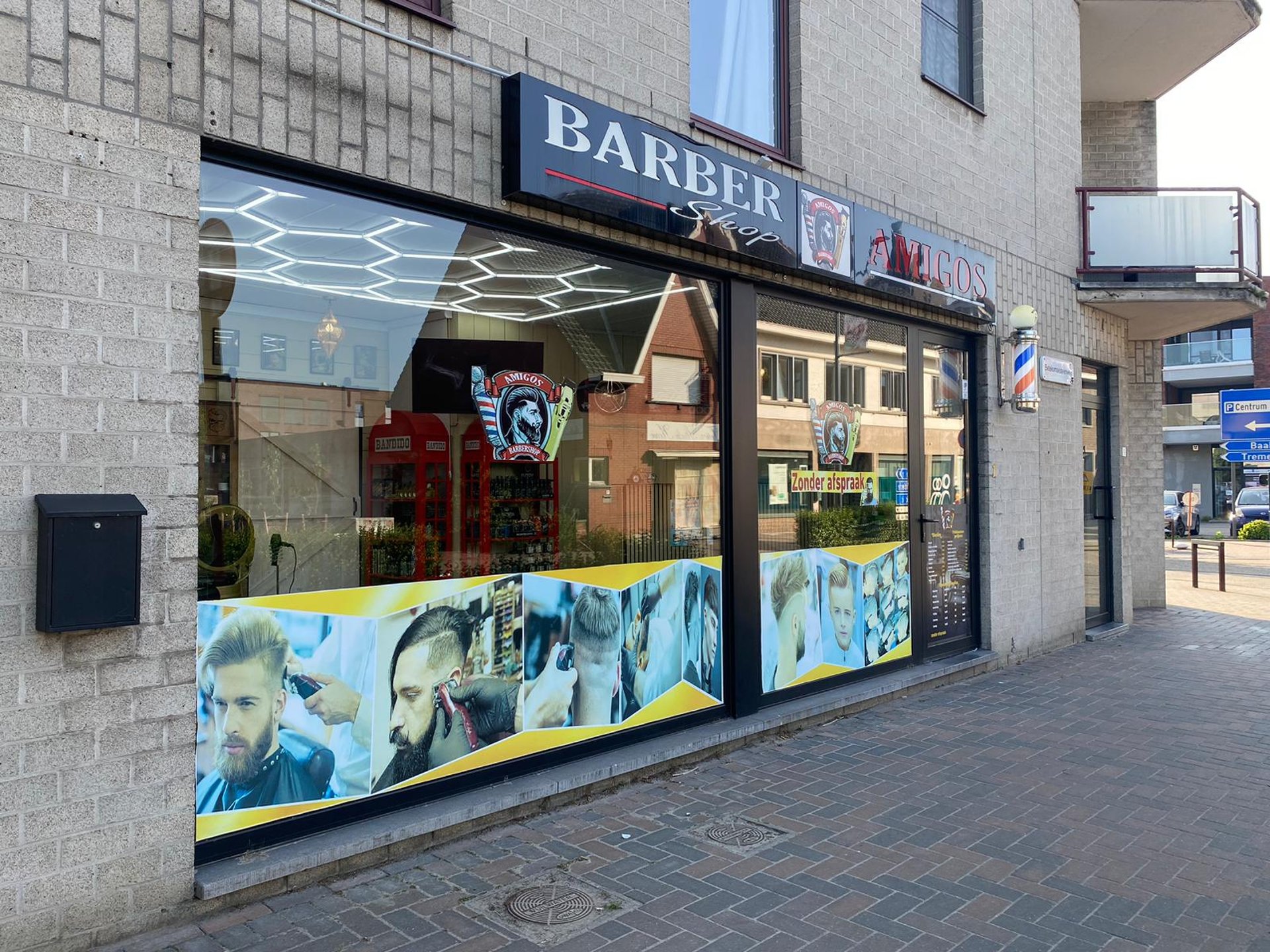 black and brown leather padded tub sofa