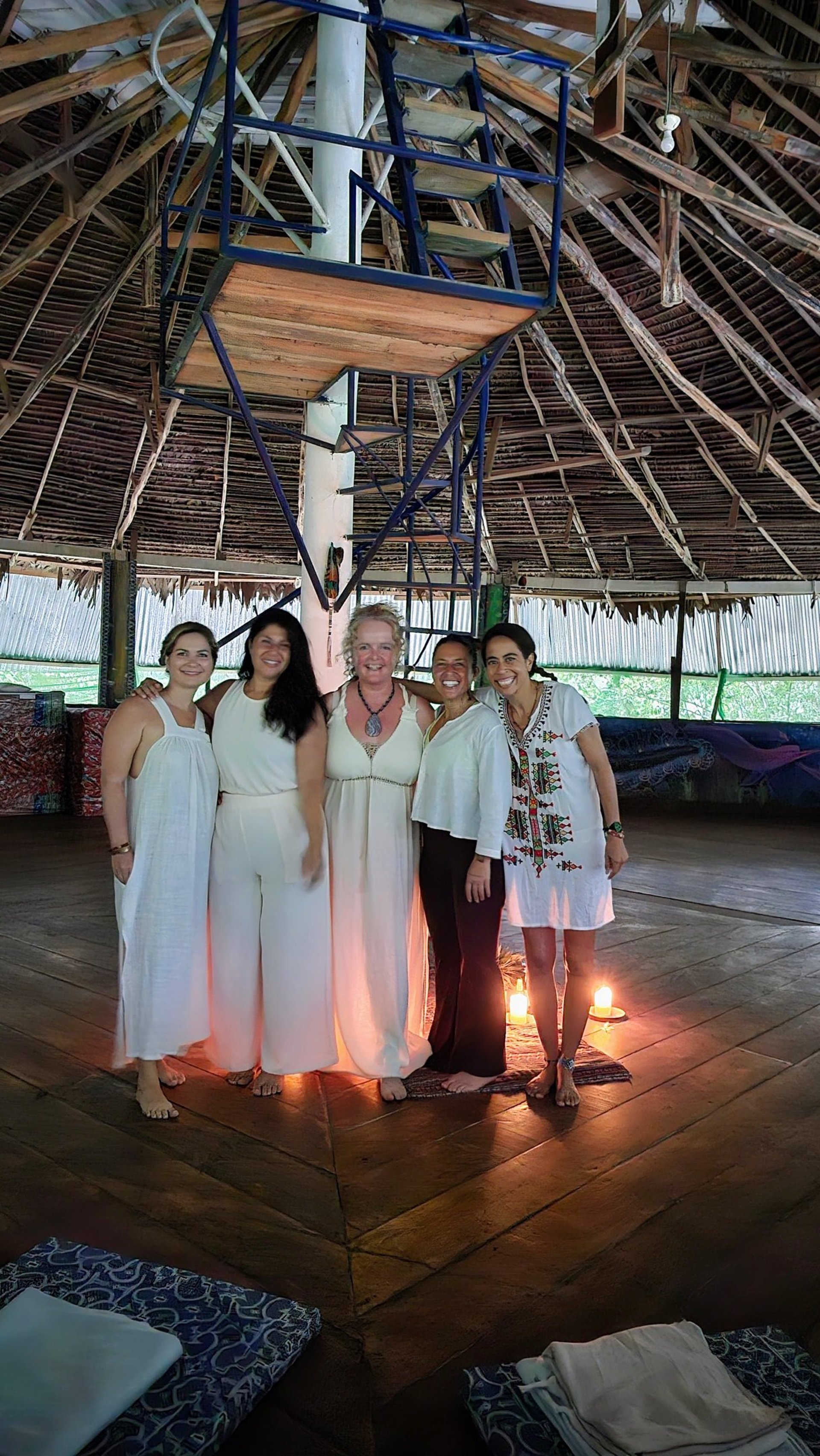 an abstract photo of a curved building with a blue sky in the background