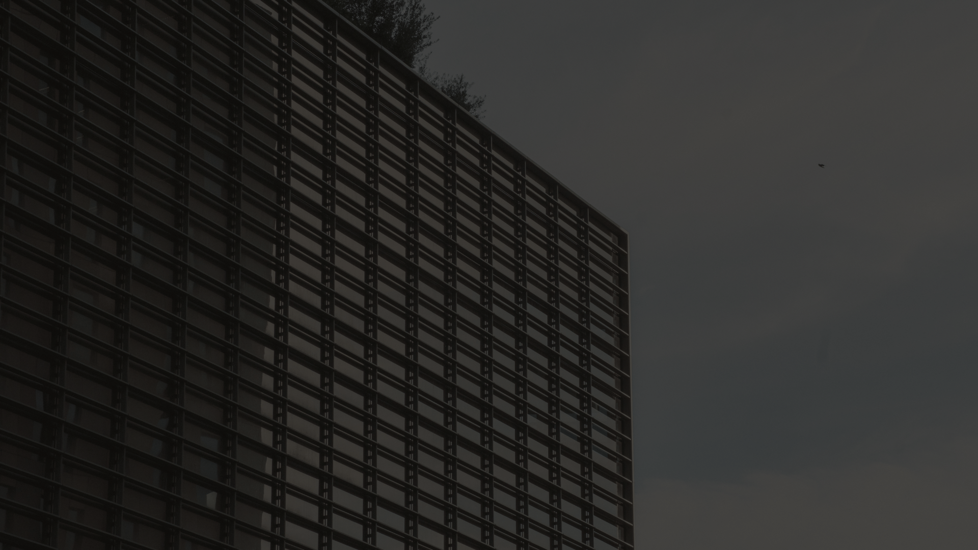 a black and white photo of lines in the dark