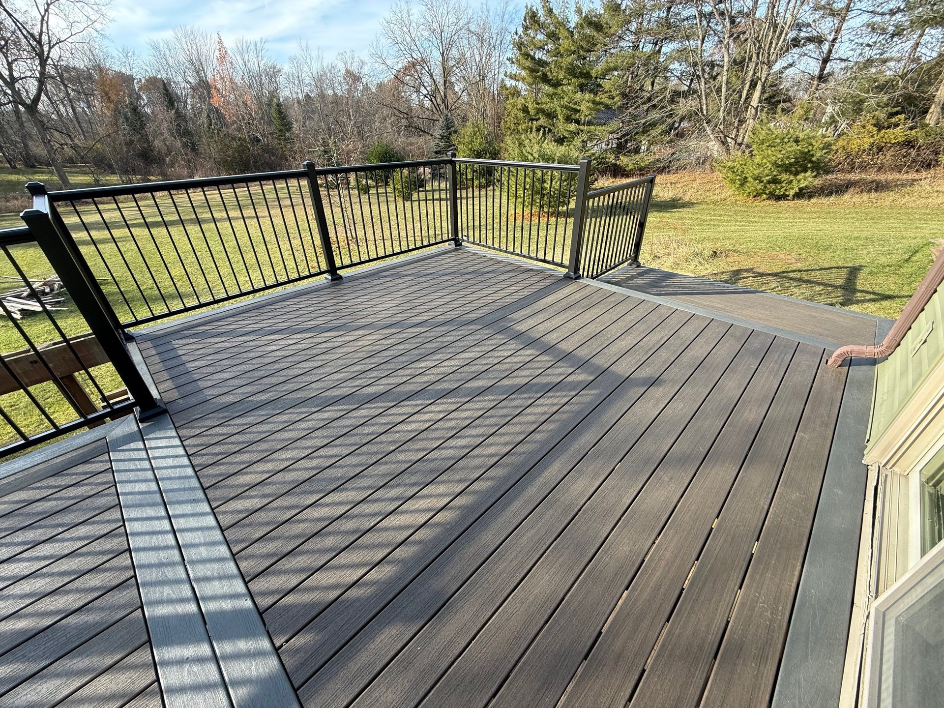 woman wearing yellow long-sleeved dress under white clouds and blue sky during daytime