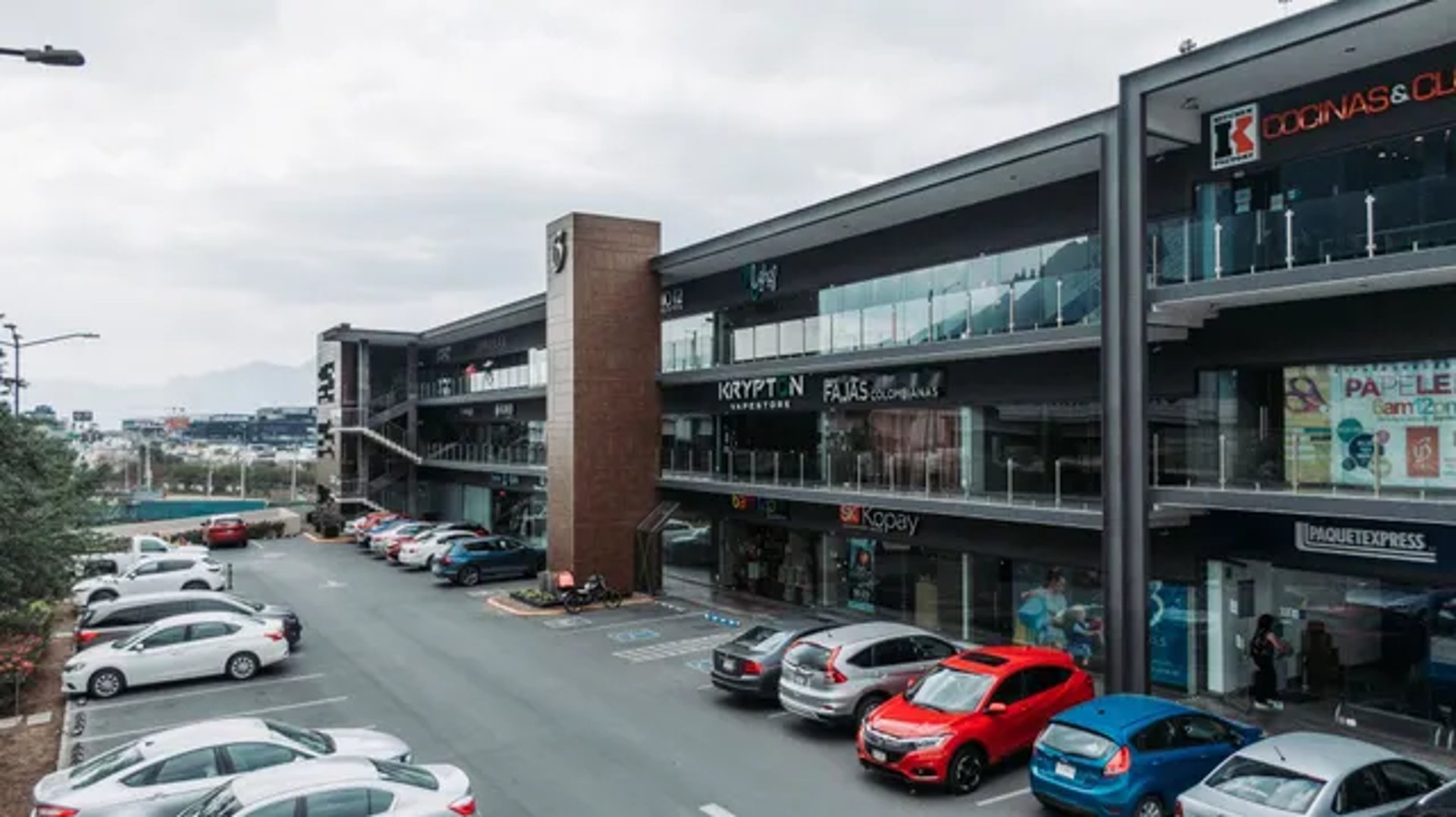 black and brown leather padded tub sofa
