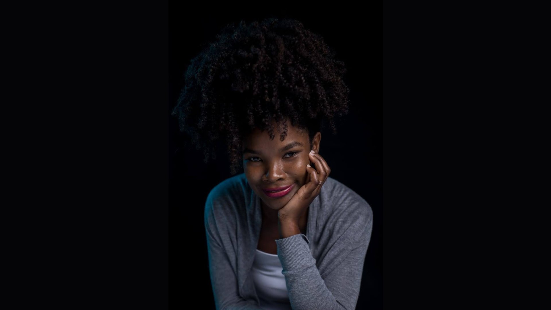 woman wearing yellow long-sleeved dress under white clouds and blue sky during daytime