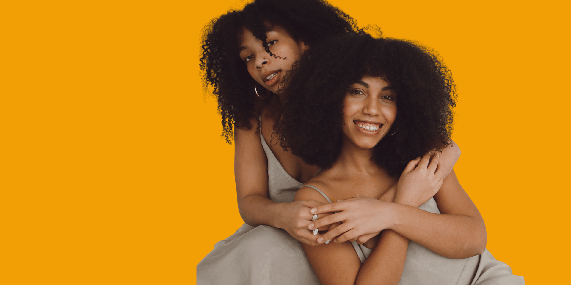 person wearing grey knit sweater