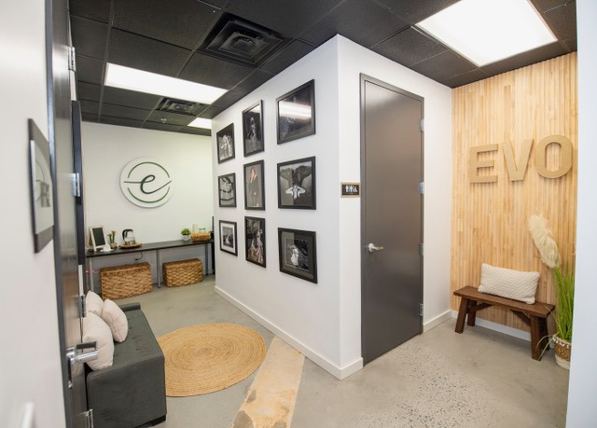 an abstract photo of a curved building with a blue sky in the background