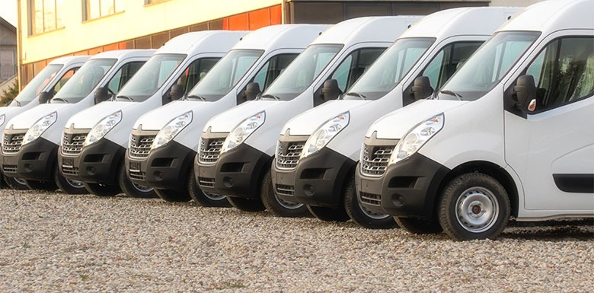 woman wearing yellow long-sleeved dress under white clouds and blue sky during daytime