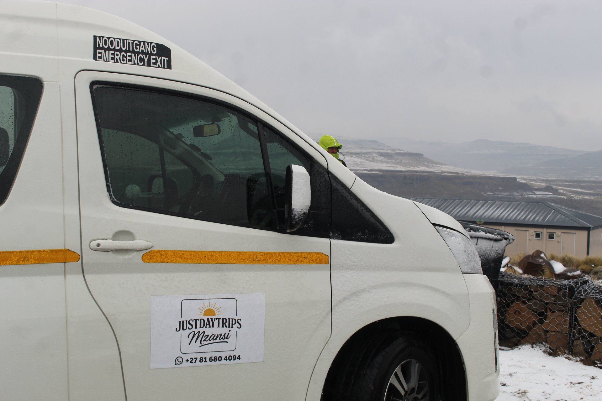 black and brown leather padded tub sofa