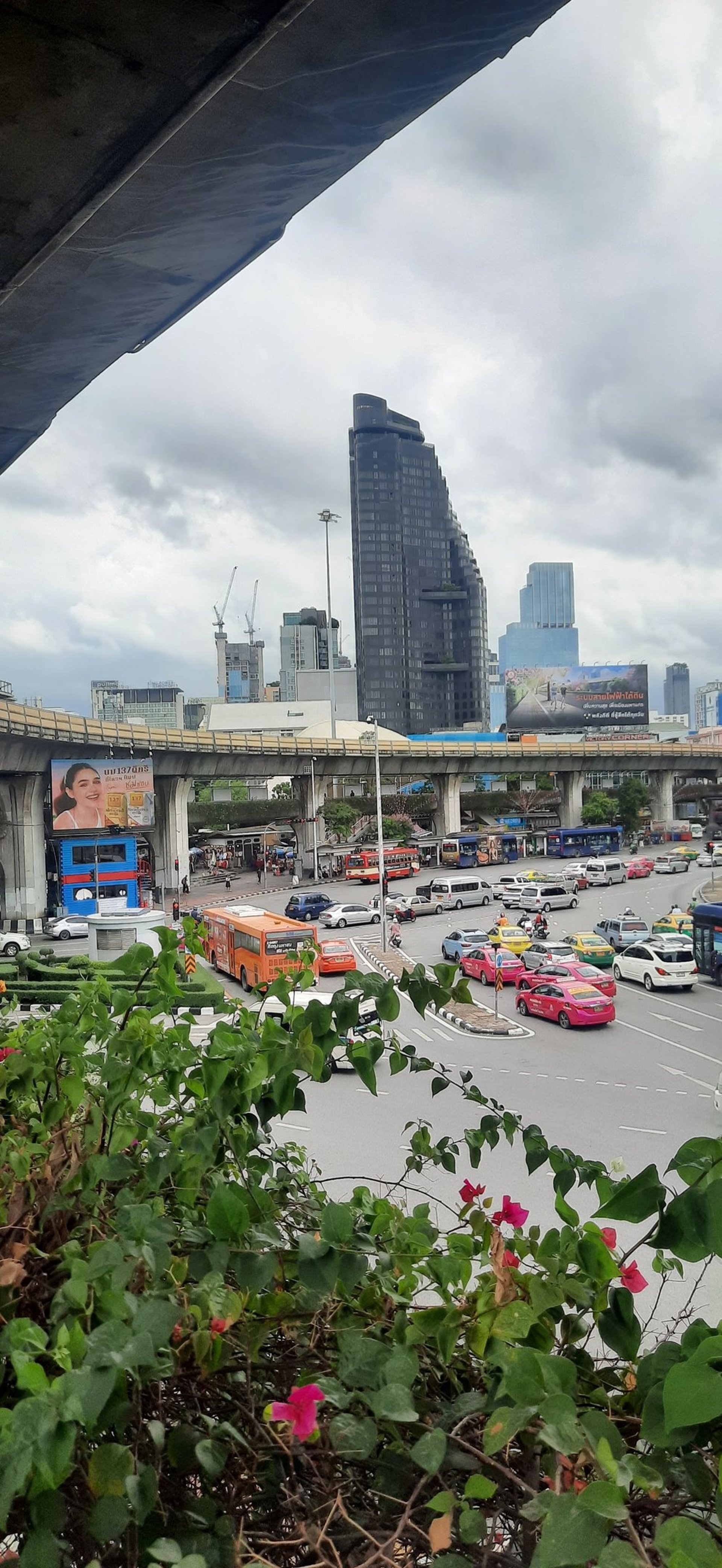 silhouette photo of man taking photo of concrete church