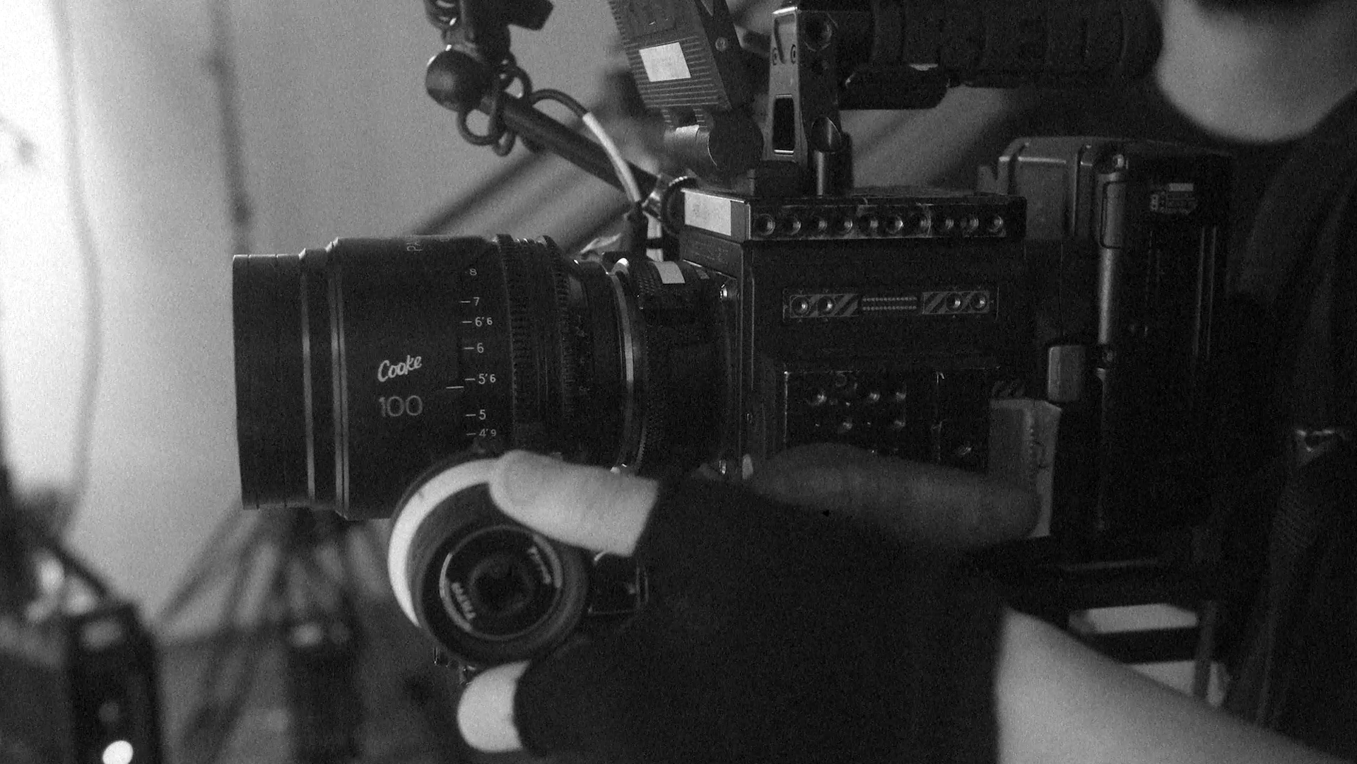 person using professional video camera