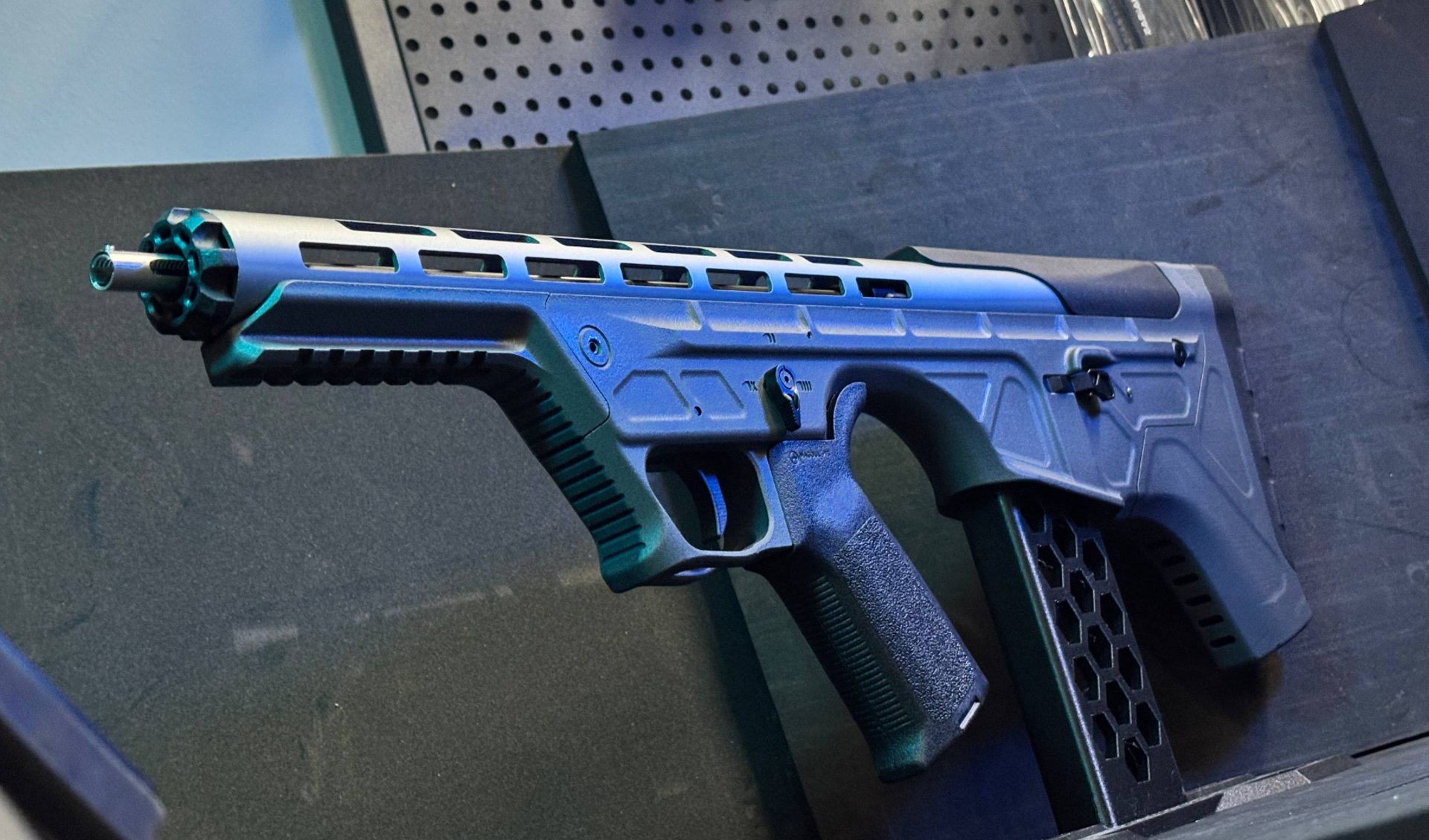 an abstract photo of a curved building with a blue sky in the background