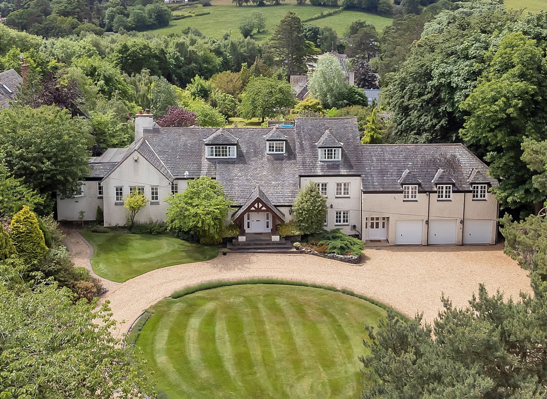 an abstract photo of a curved building with a blue sky in the background