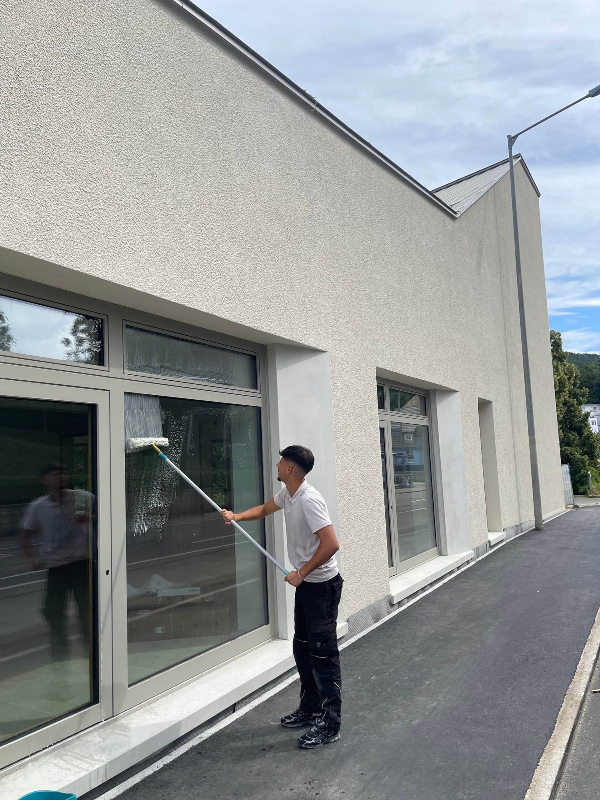 hallway between glass-panel doors