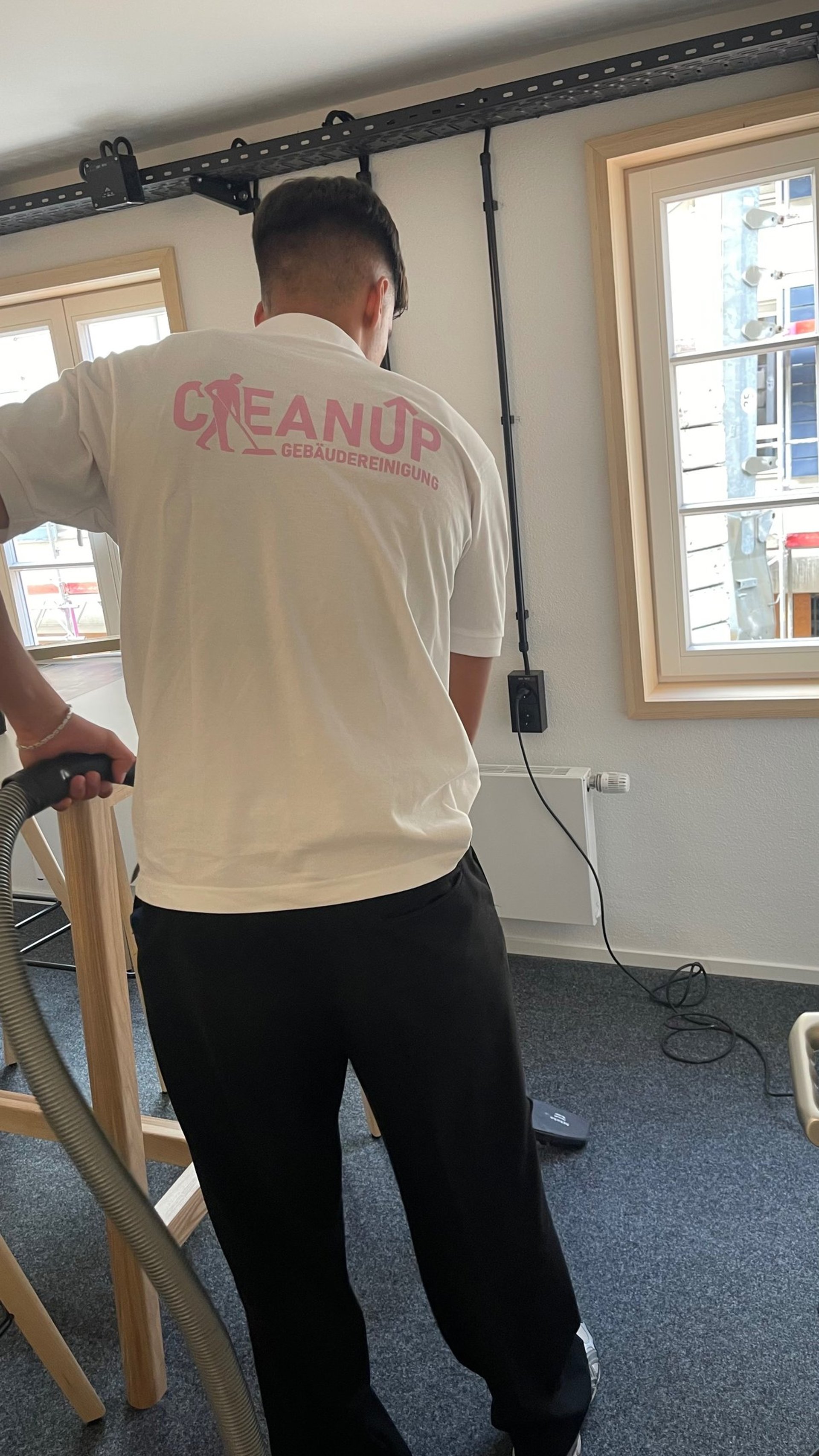 hallway between glass-panel doors