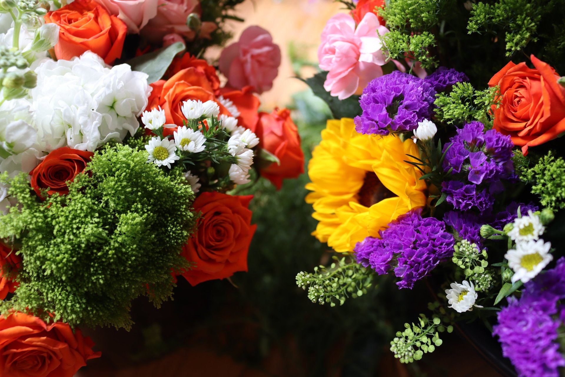 person holding bouquet of flowers