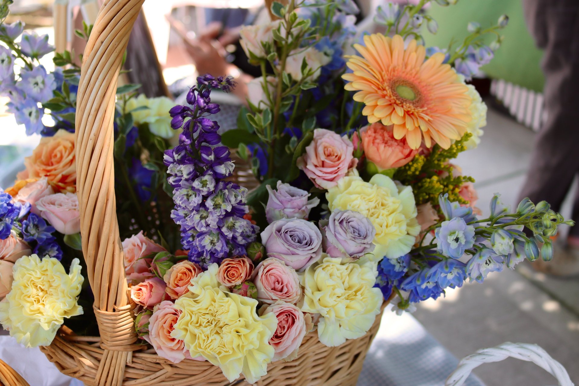 person holding bouquet of flowers