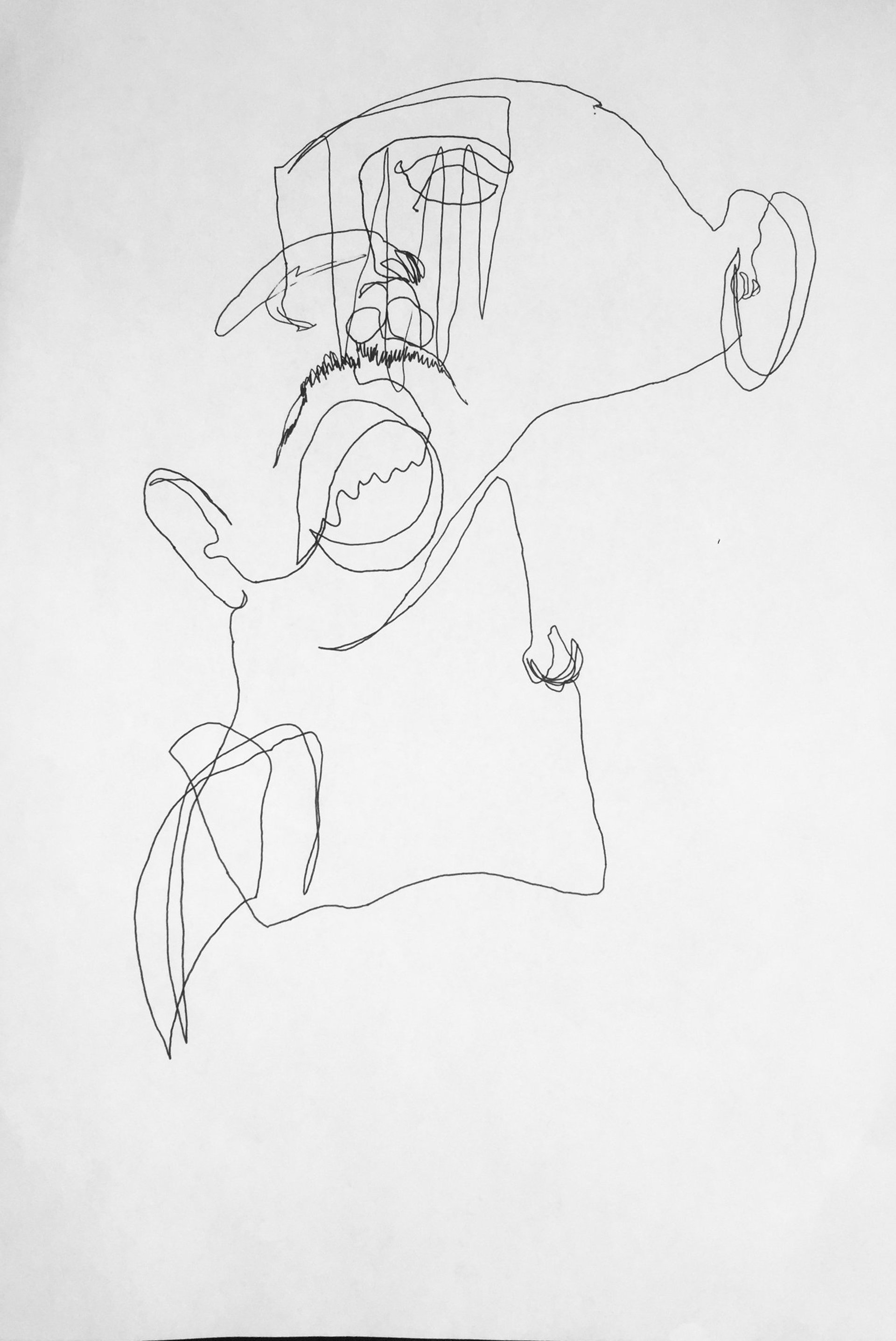 an abstract photo of a curved building with a blue sky in the background