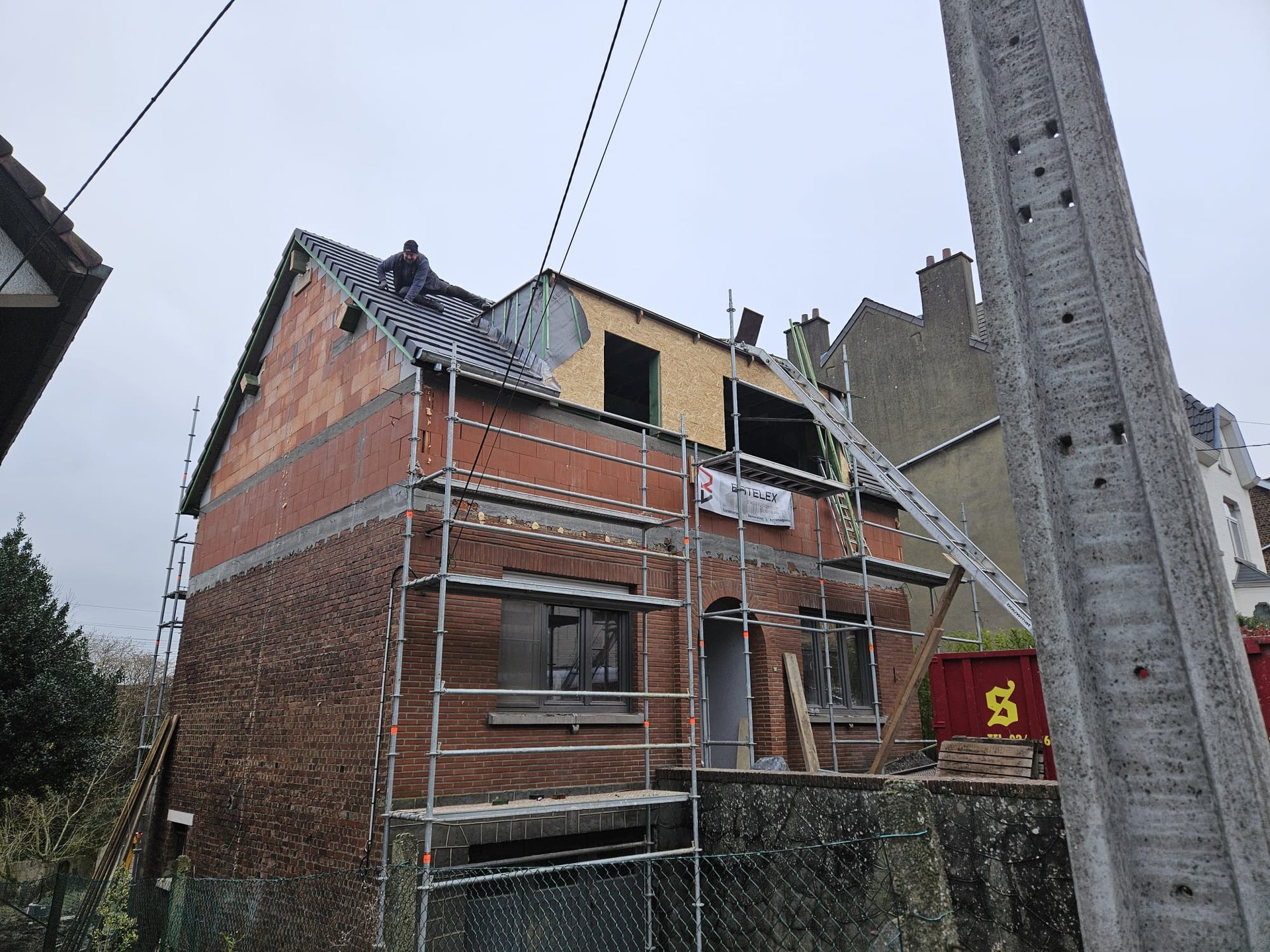 black and brown leather padded tub sofa