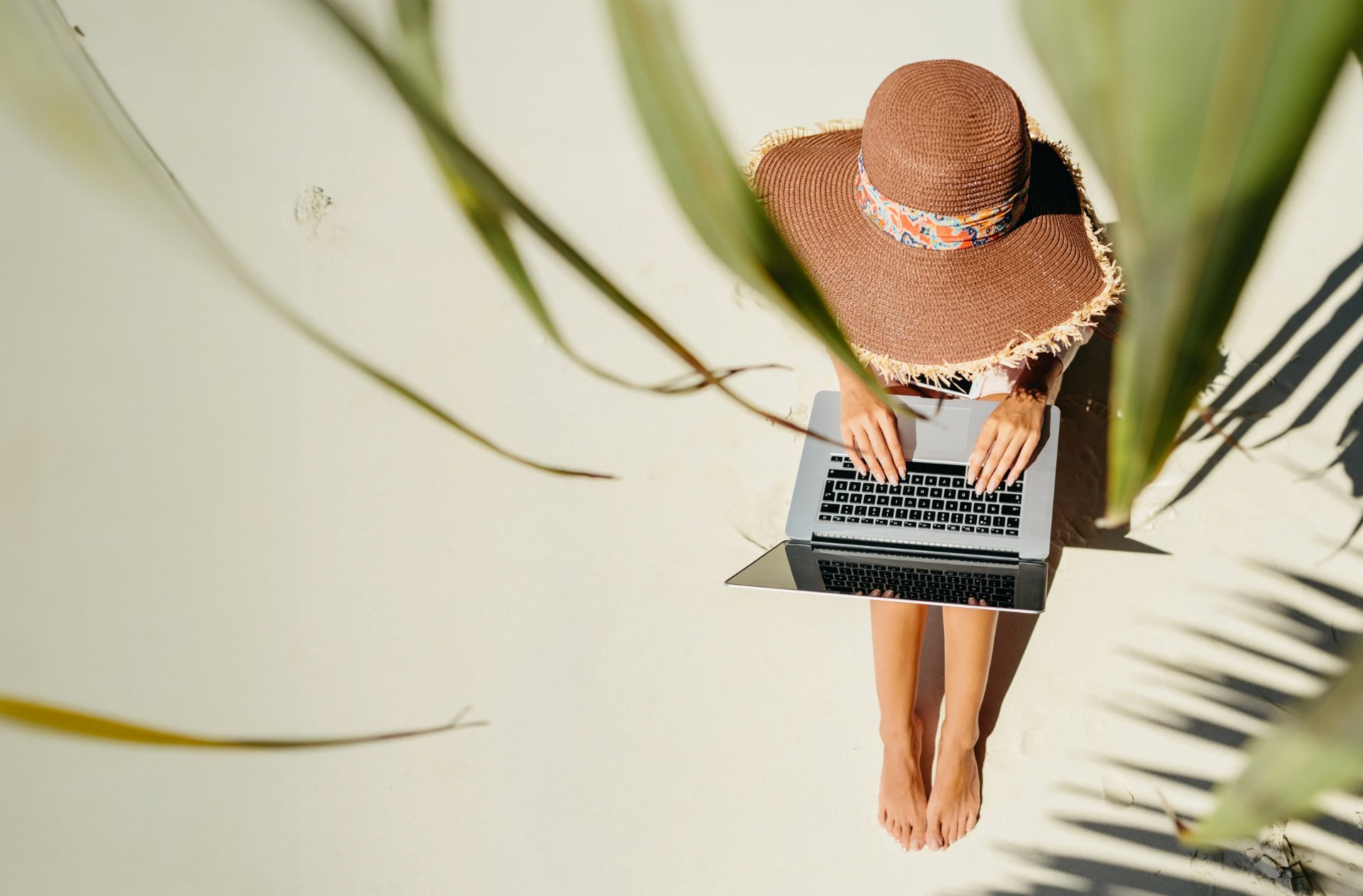 a beach with people swimming