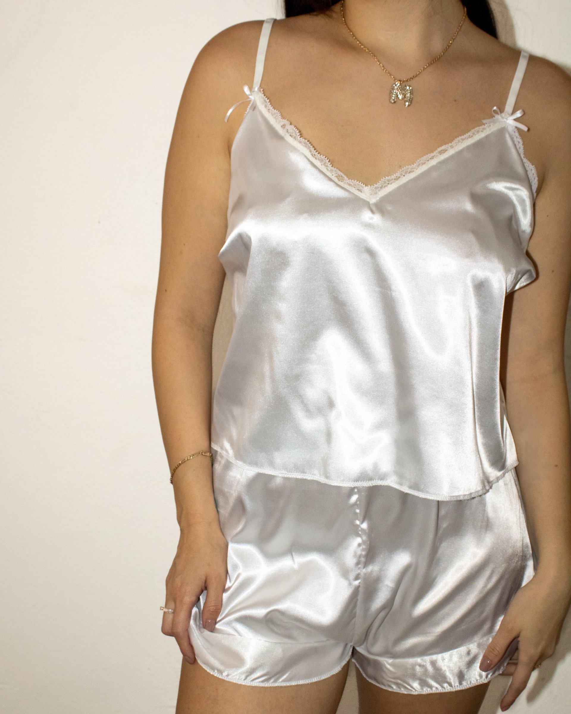 an abstract photo of a curved building with a blue sky in the background