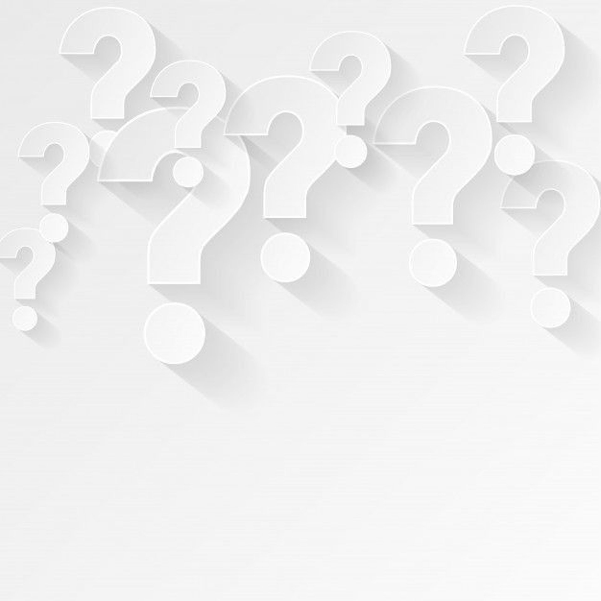 a hand holding a paintbrush and a red question mark