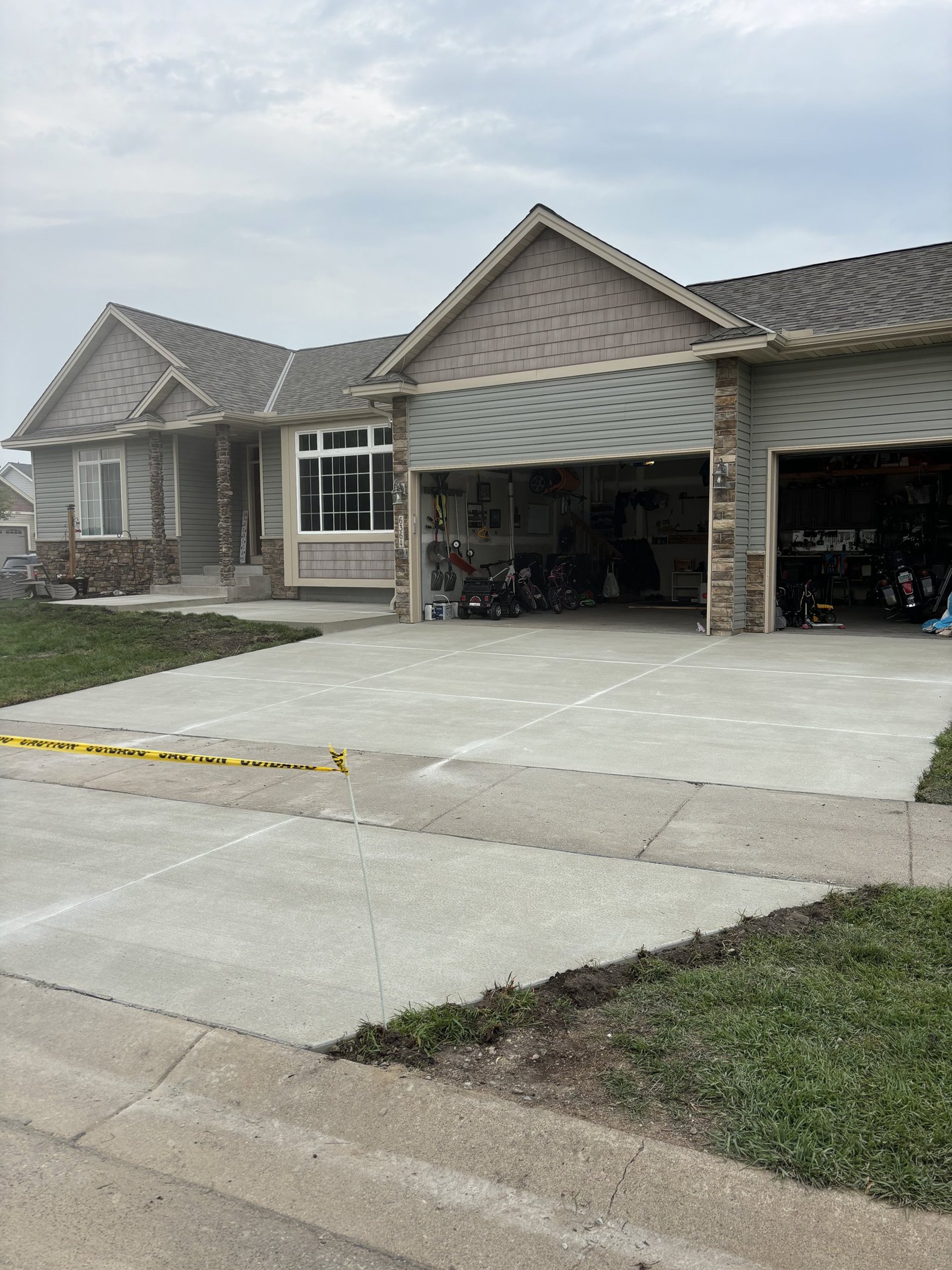 new driveway installation at residential home 