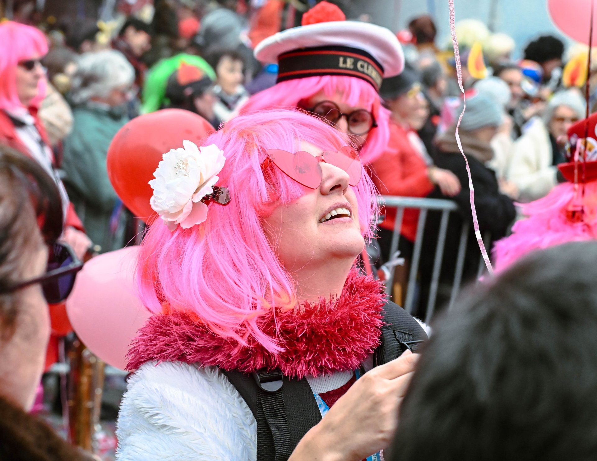 an abstract photo of a curved building with a blue sky in the background
