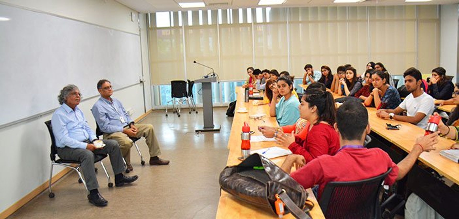 black and brown leather padded tub sofa