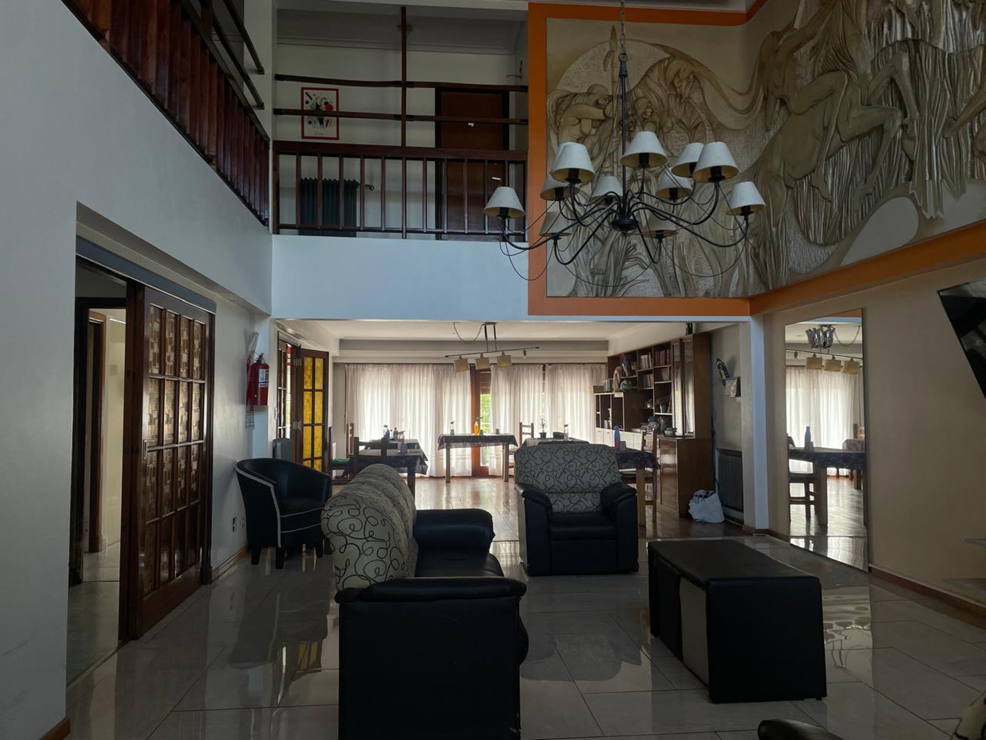 woman wearing yellow long-sleeved dress under white clouds and blue sky during daytime