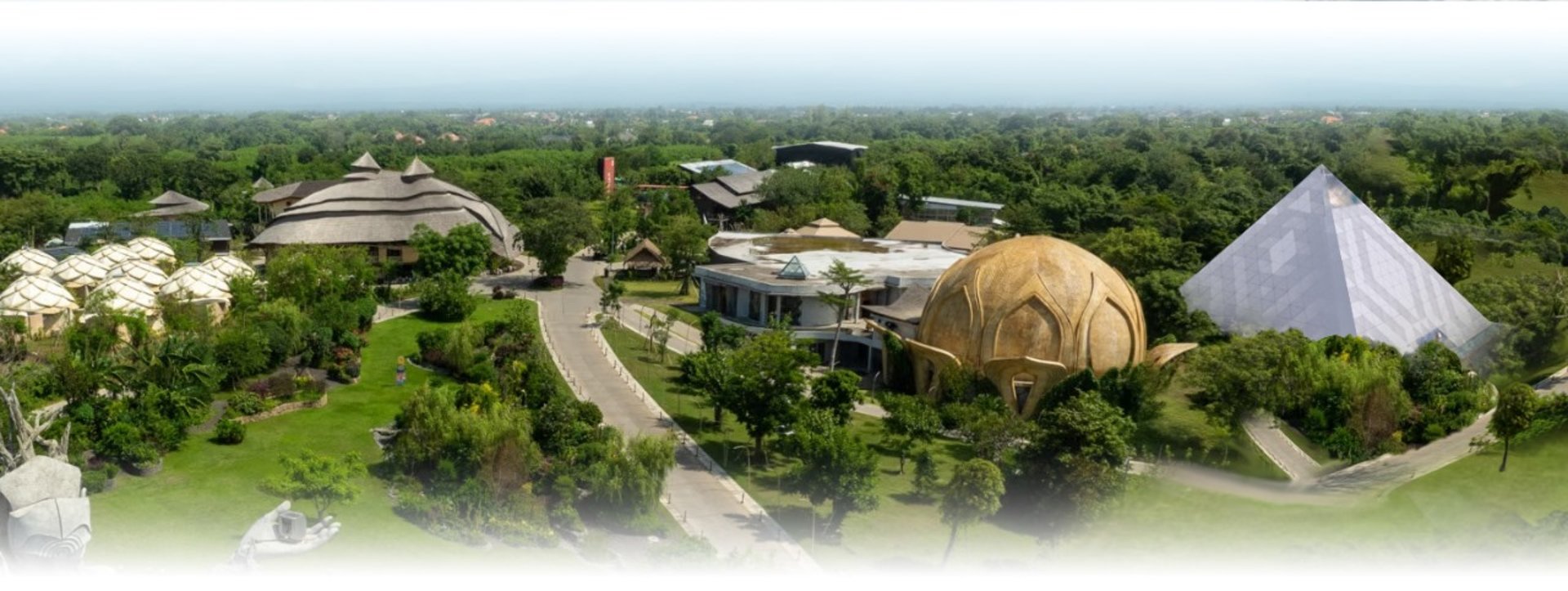 woman wearing yellow long-sleeved dress under white clouds and blue sky during daytime