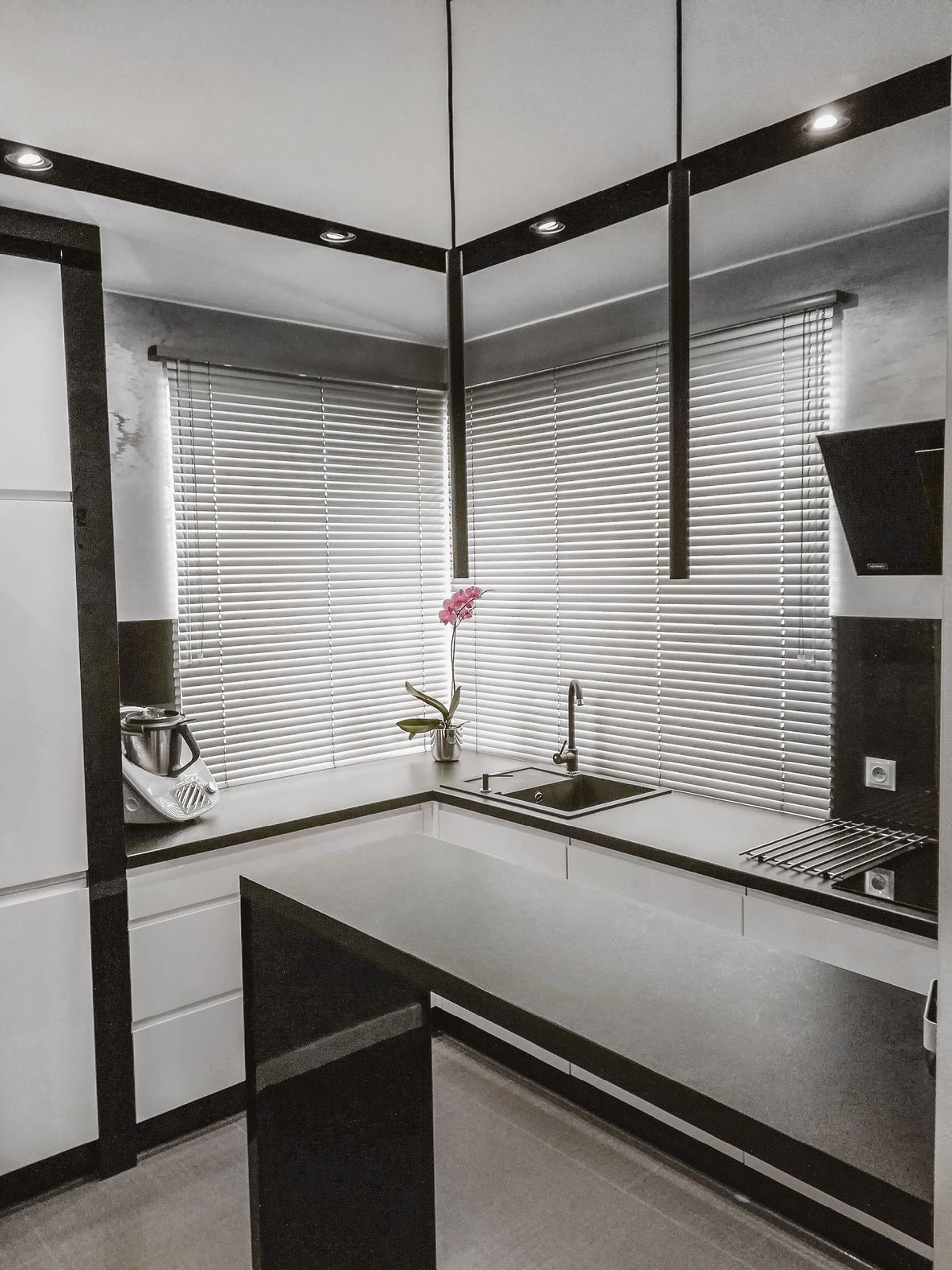 an abstract photo of a curved building with a blue sky in the background