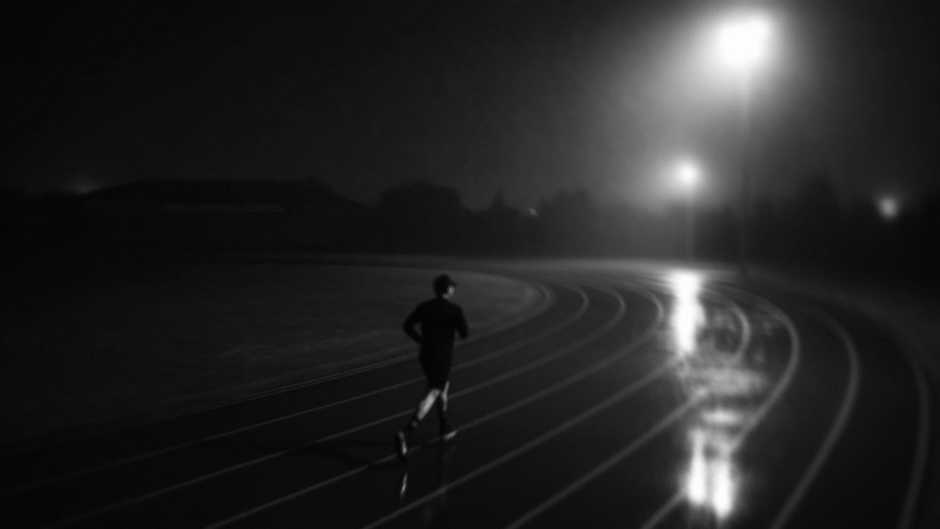 an abstract photo of a curved building with a blue sky in the background