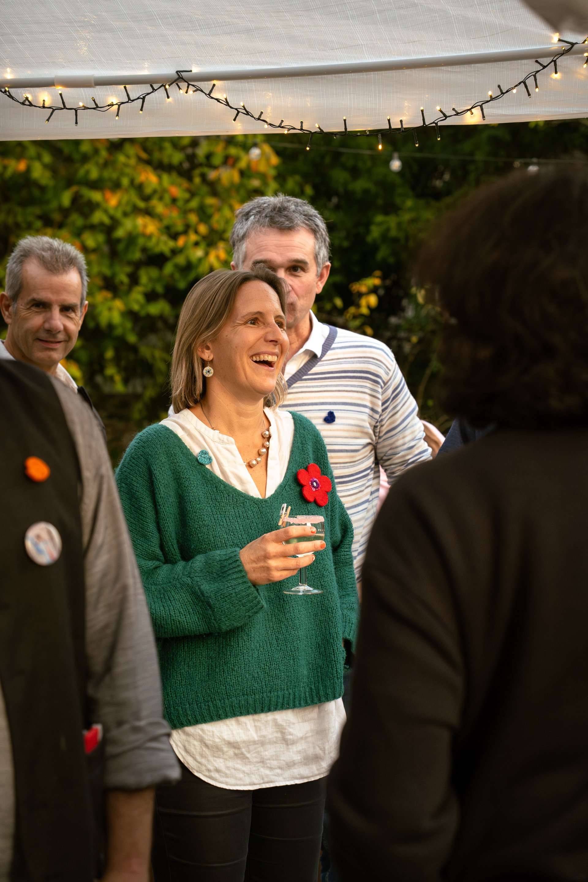 an abstract photo of a curved building with a blue sky in the background