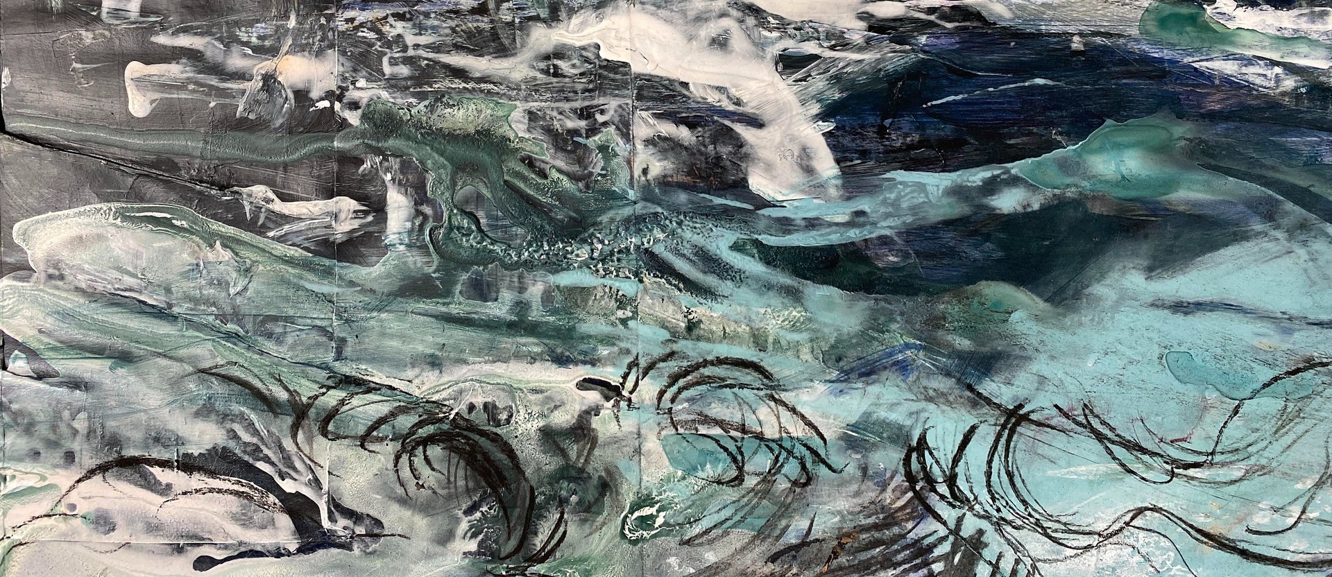 an abstract photo of a curved building with a blue sky in the background