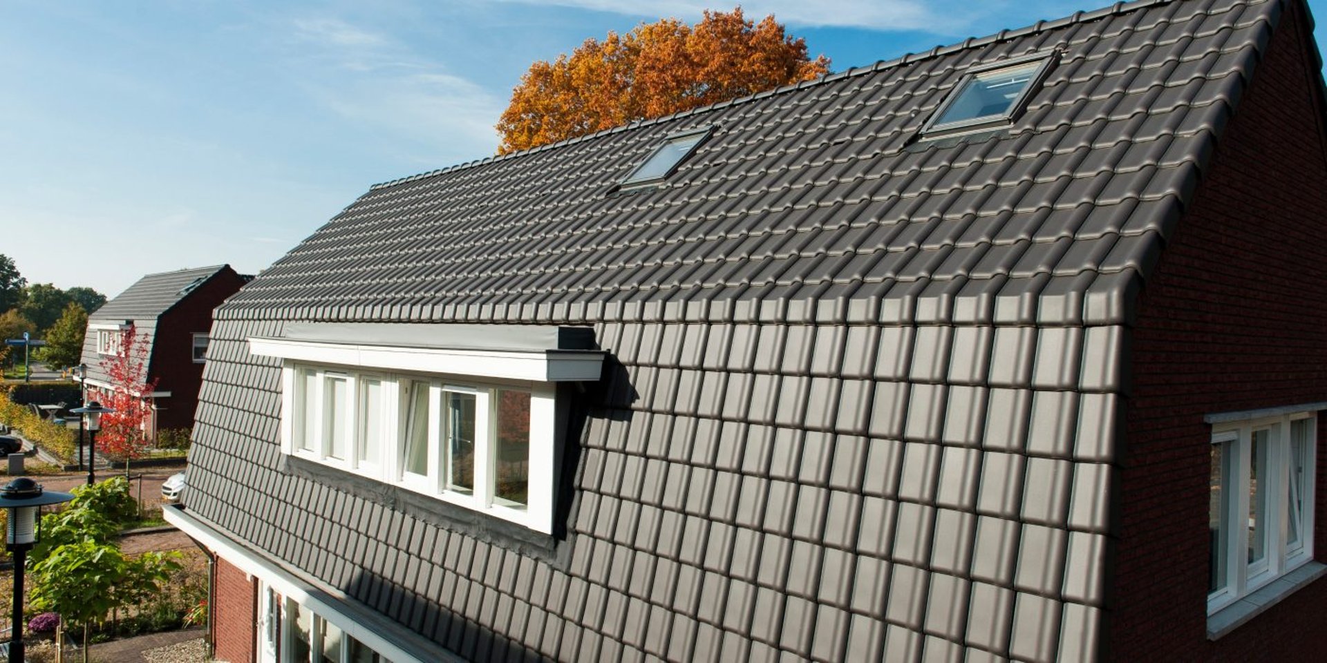 black and brown leather padded tub sofa