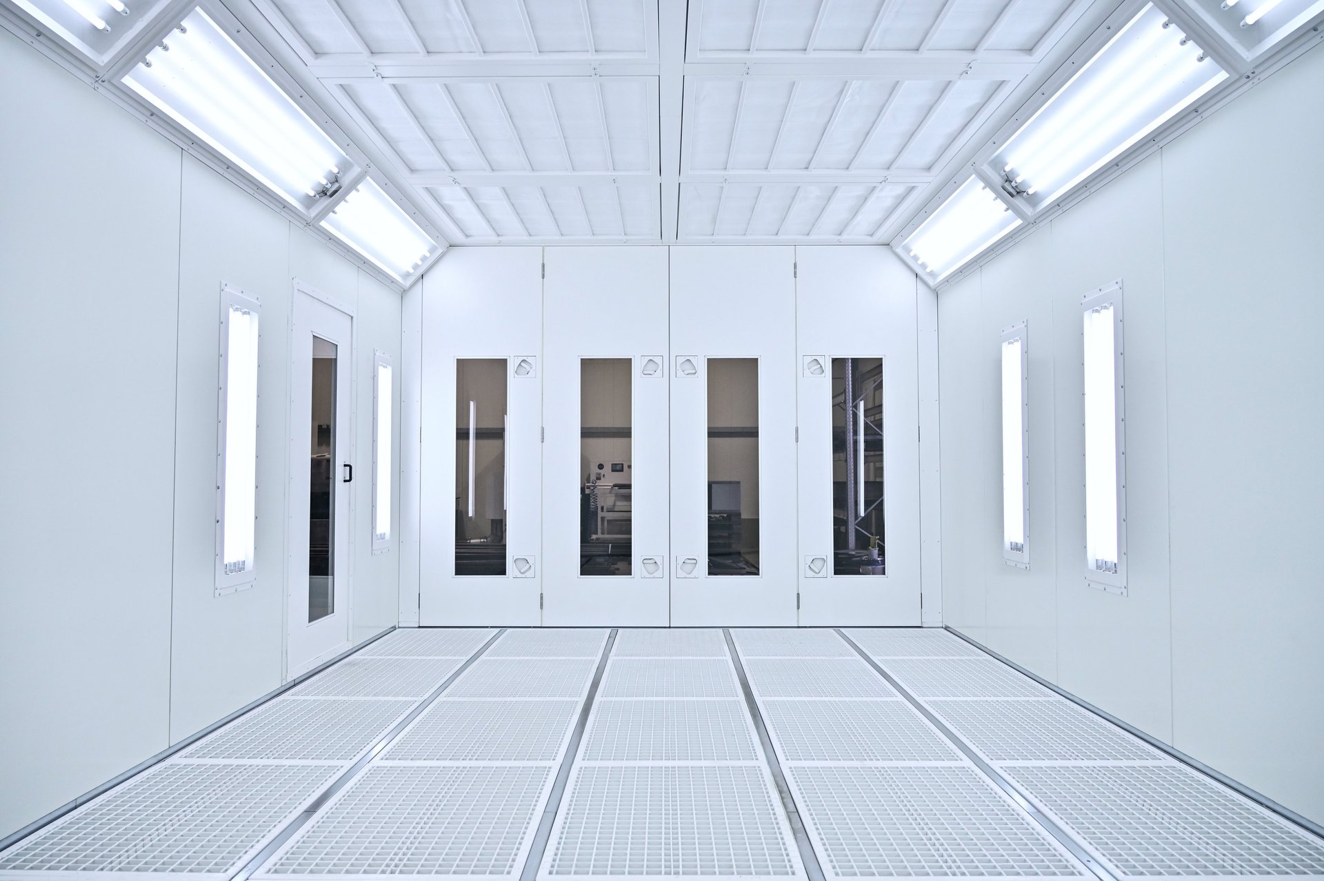 an abstract photo of a curved building with a blue sky in the background