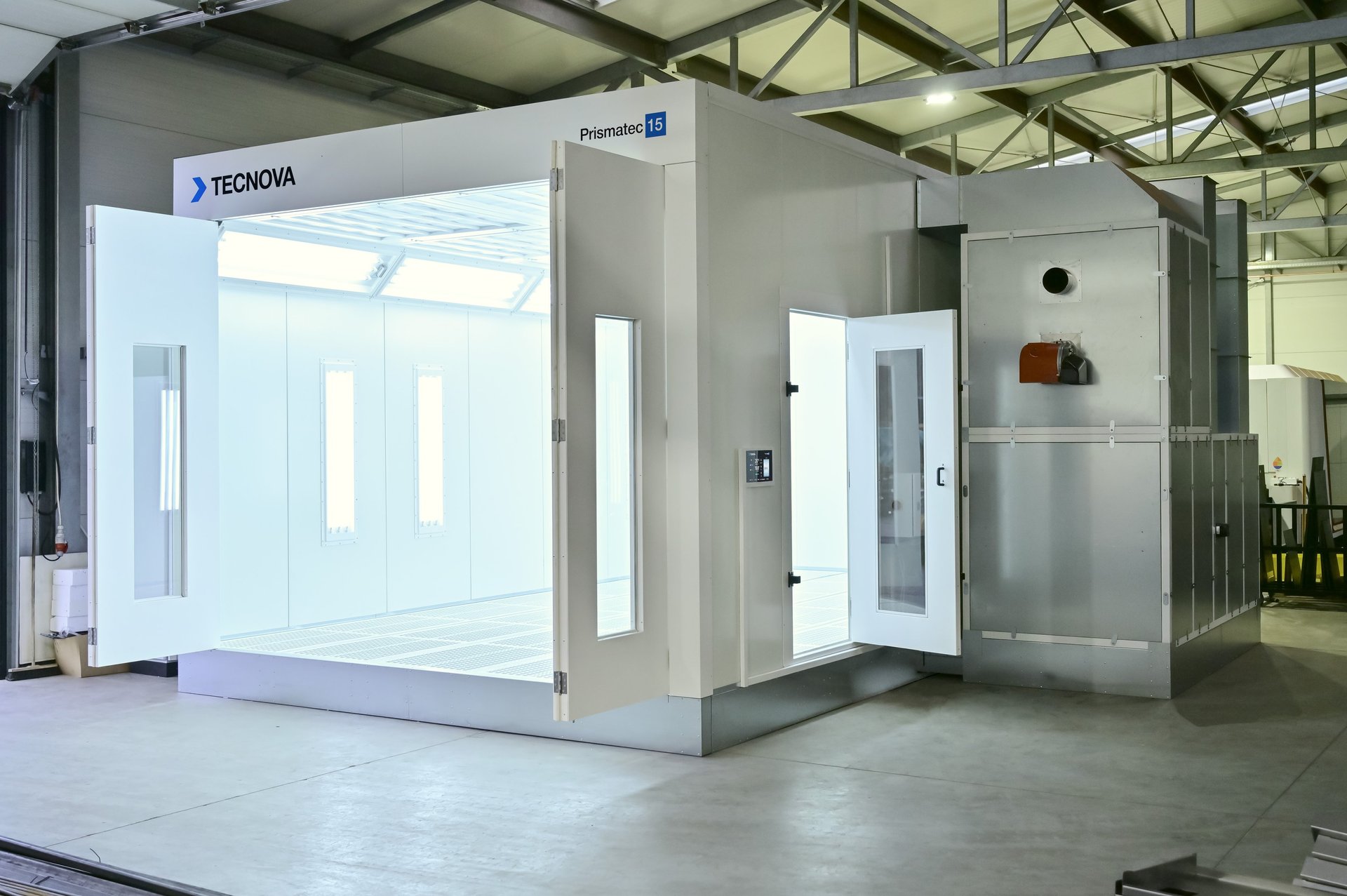 an abstract photo of a curved building with a blue sky in the background
