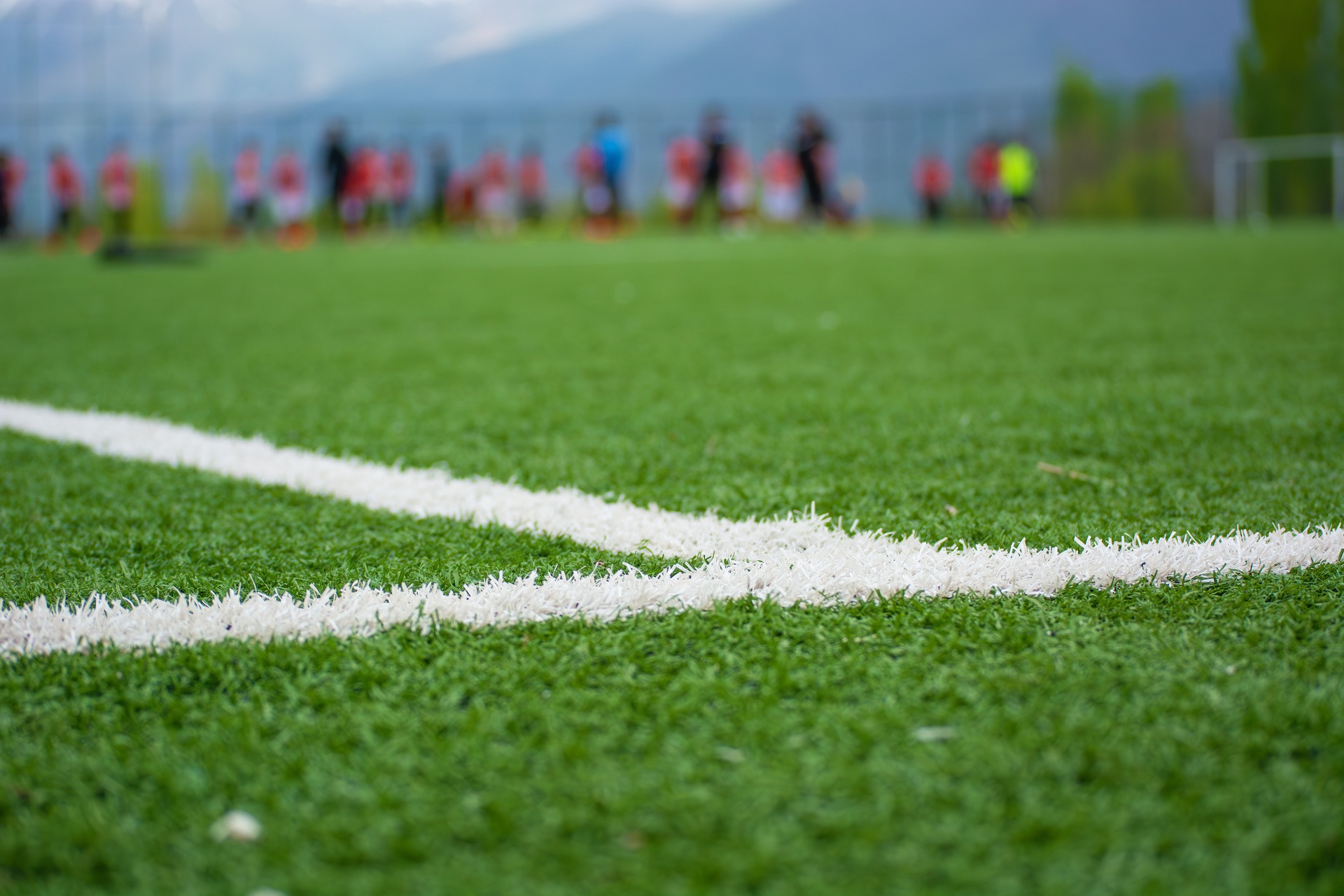 an abstract photo of a curved building with a blue sky in the background