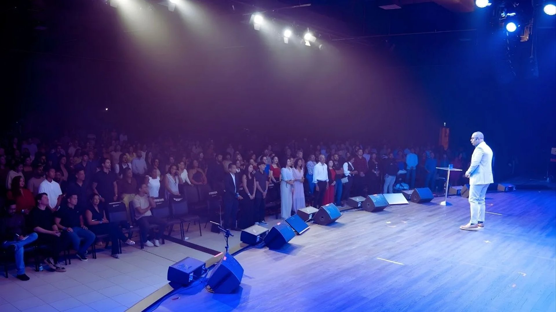 an abstract photo of a curved building with a blue sky in the background
