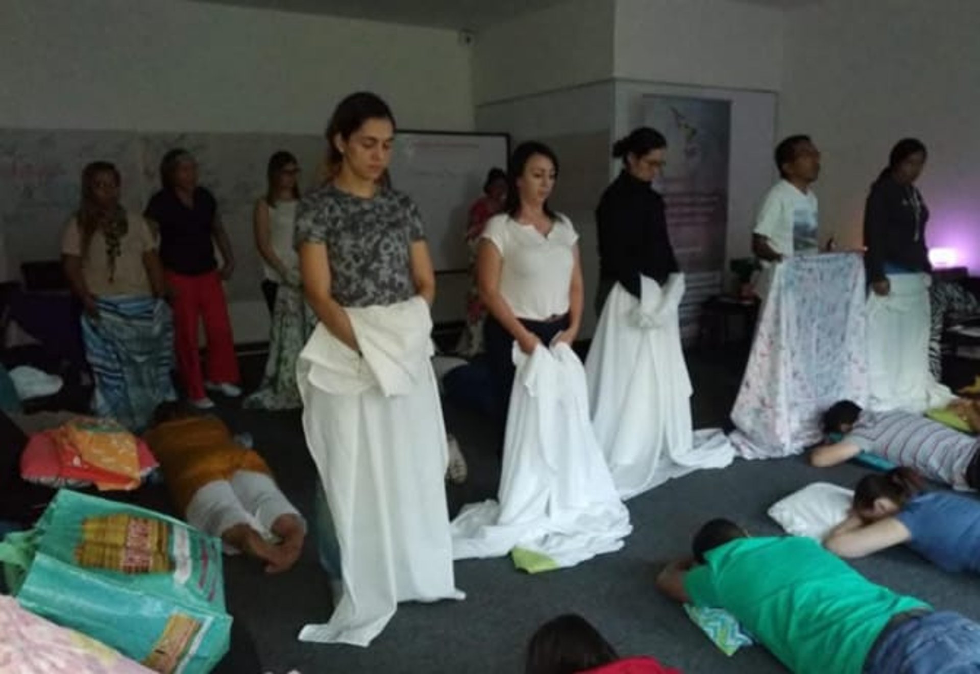 woman wearing yellow long-sleeved dress under white clouds and blue sky during daytime