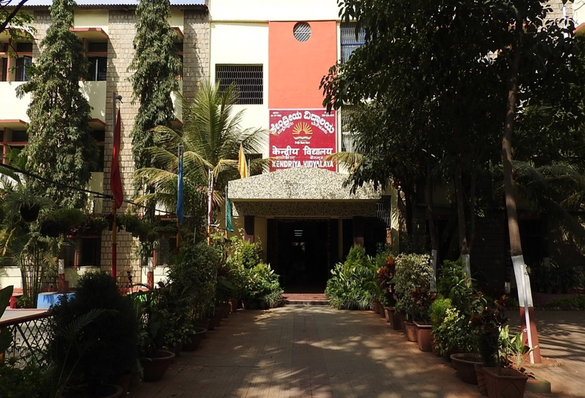 an abstract photo of a curved building with a blue sky in the background