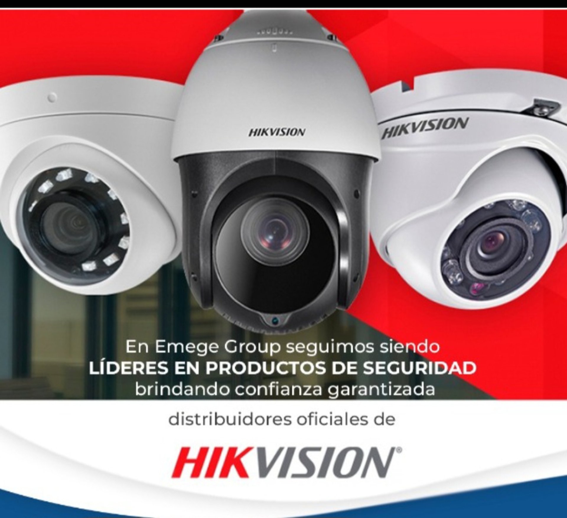 white surveillance camera hanging on wall