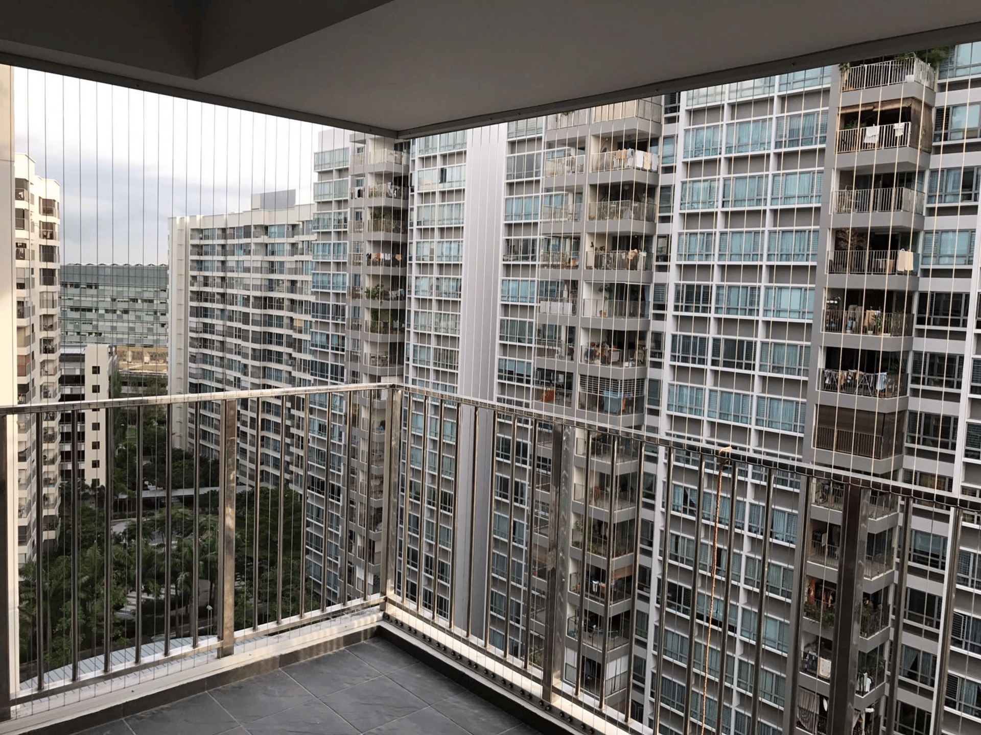 an abstract photo of a curved building with a blue sky in the background