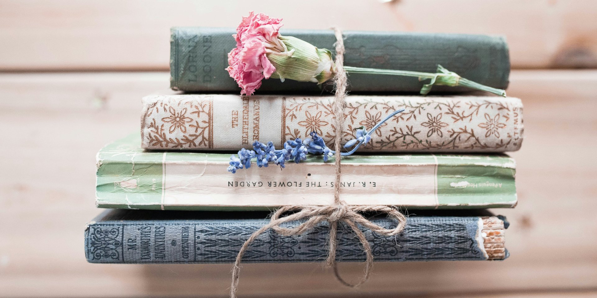 a bookshelf filled with lots of different colored books