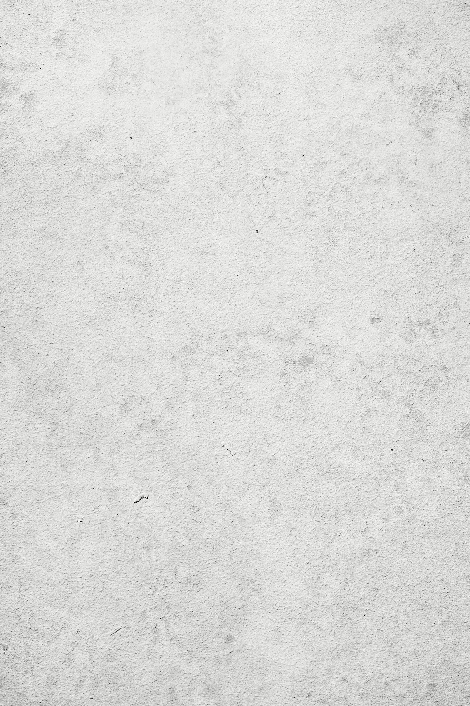 a black and white photo of a person on a surfboard