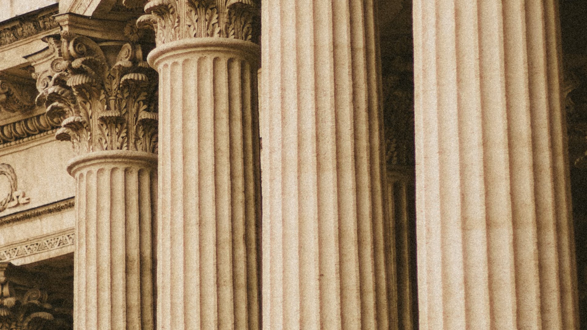woman in dress holding sword figurine