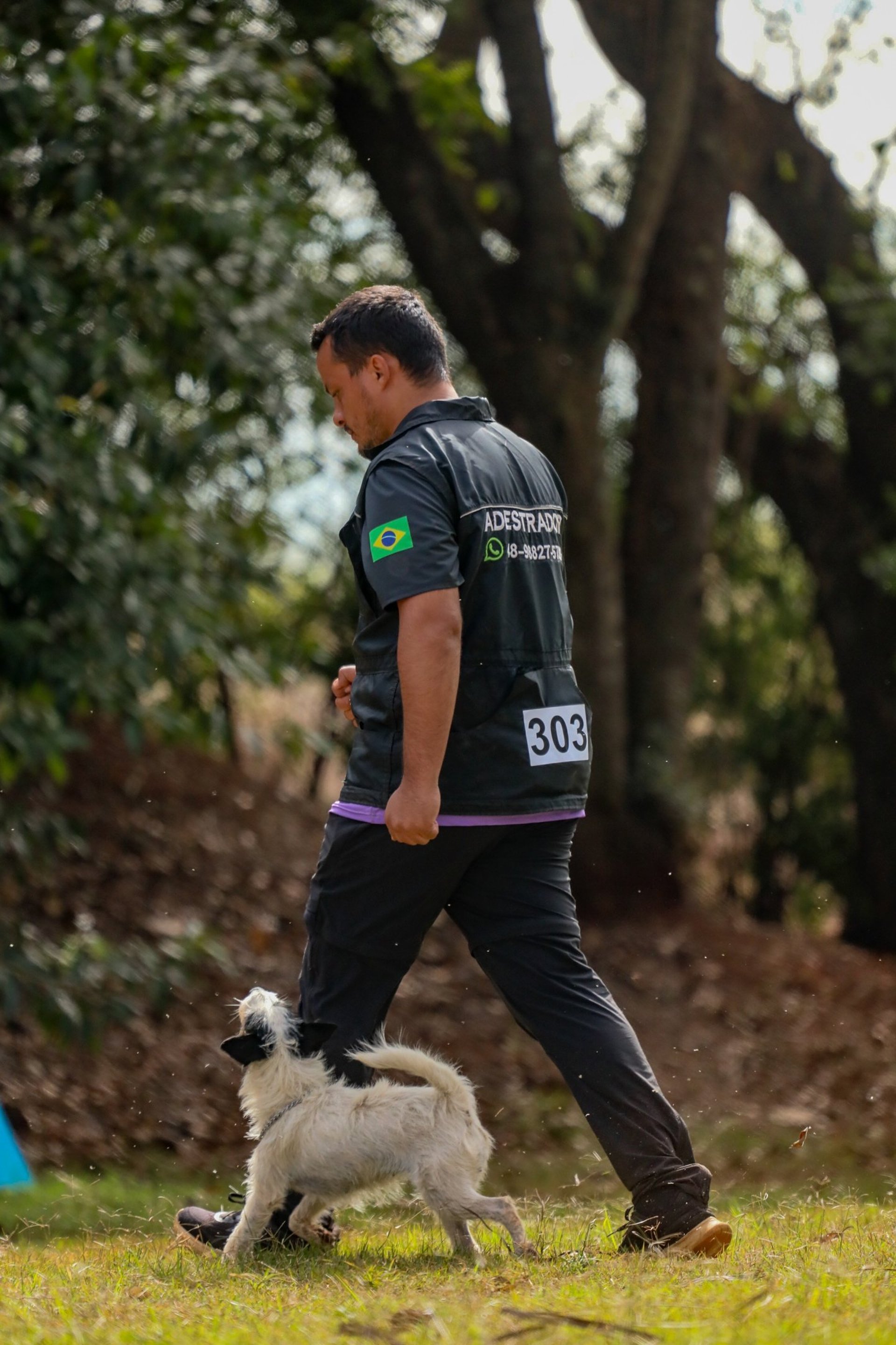 woman wearing yellow long-sleeved dress under white clouds and blue sky during daytime