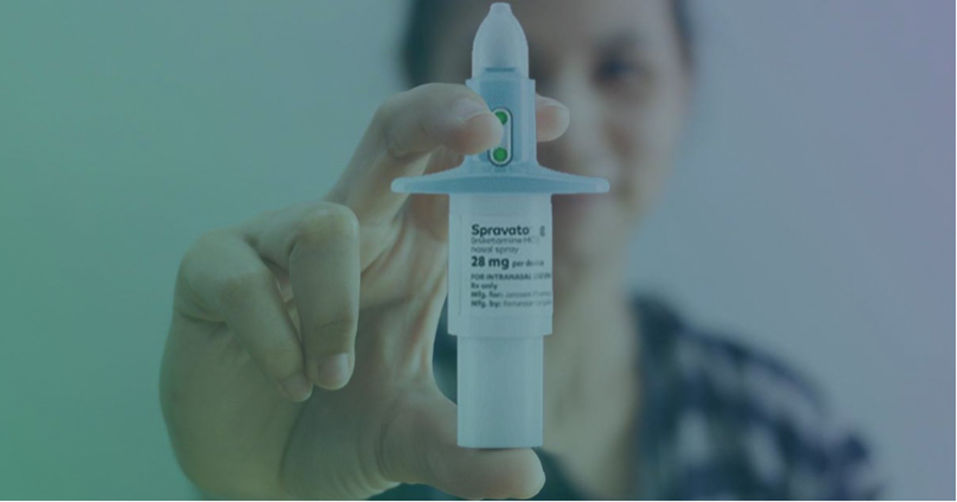 person sitting in a chair in front of a man