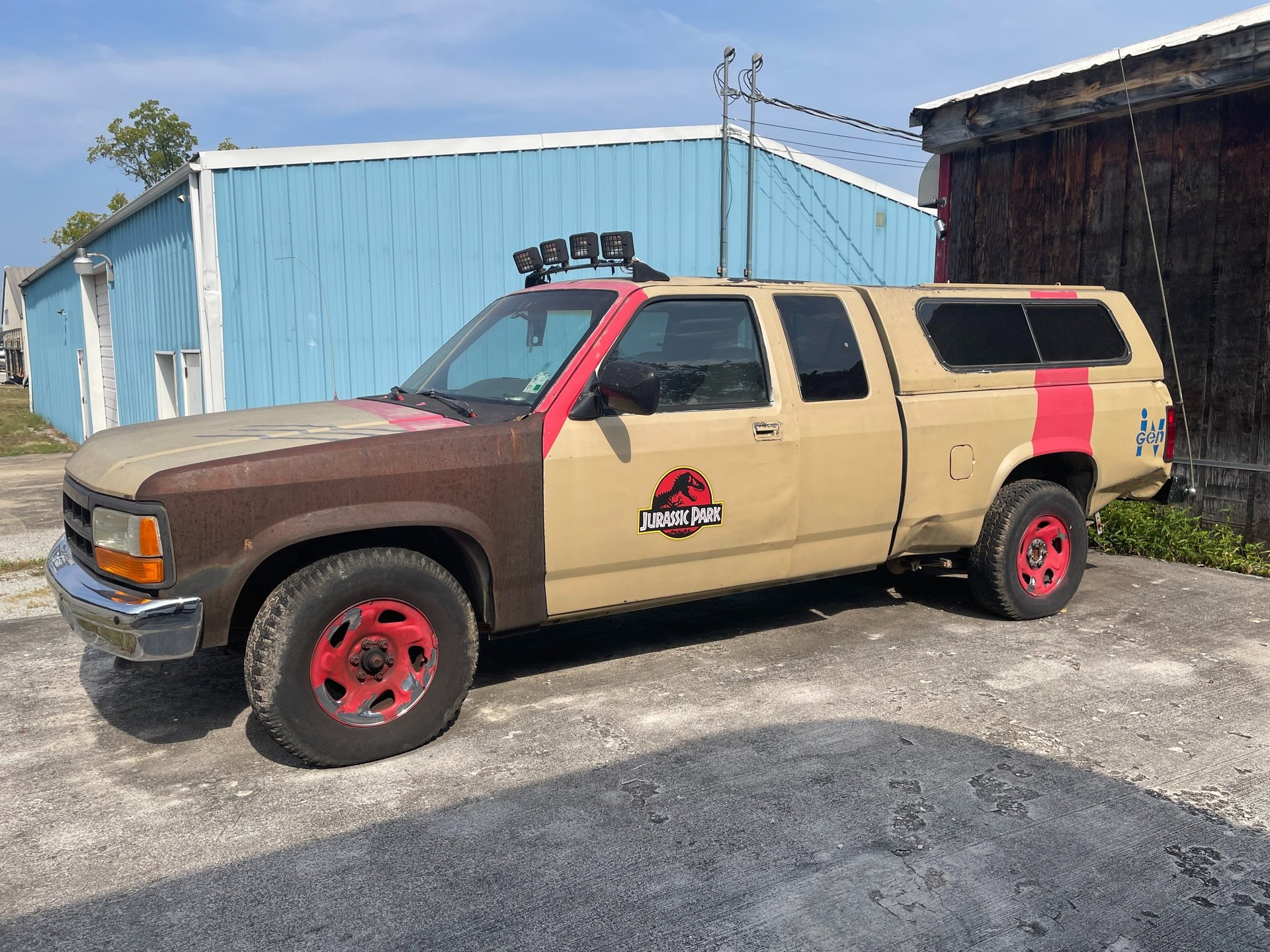 brown dome concrete building near bridge at daytime
