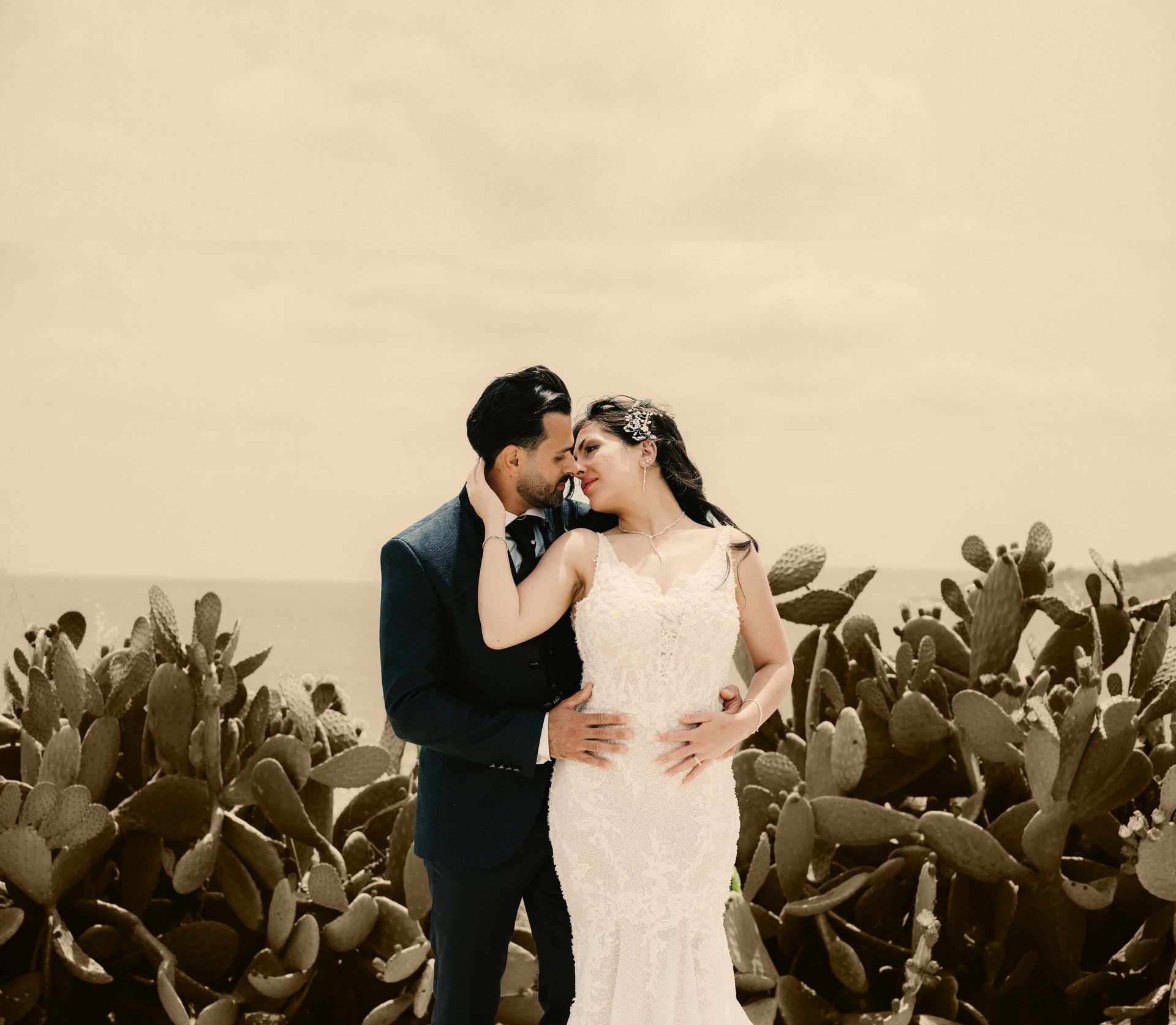 groom beside bride holding bouquet flowers